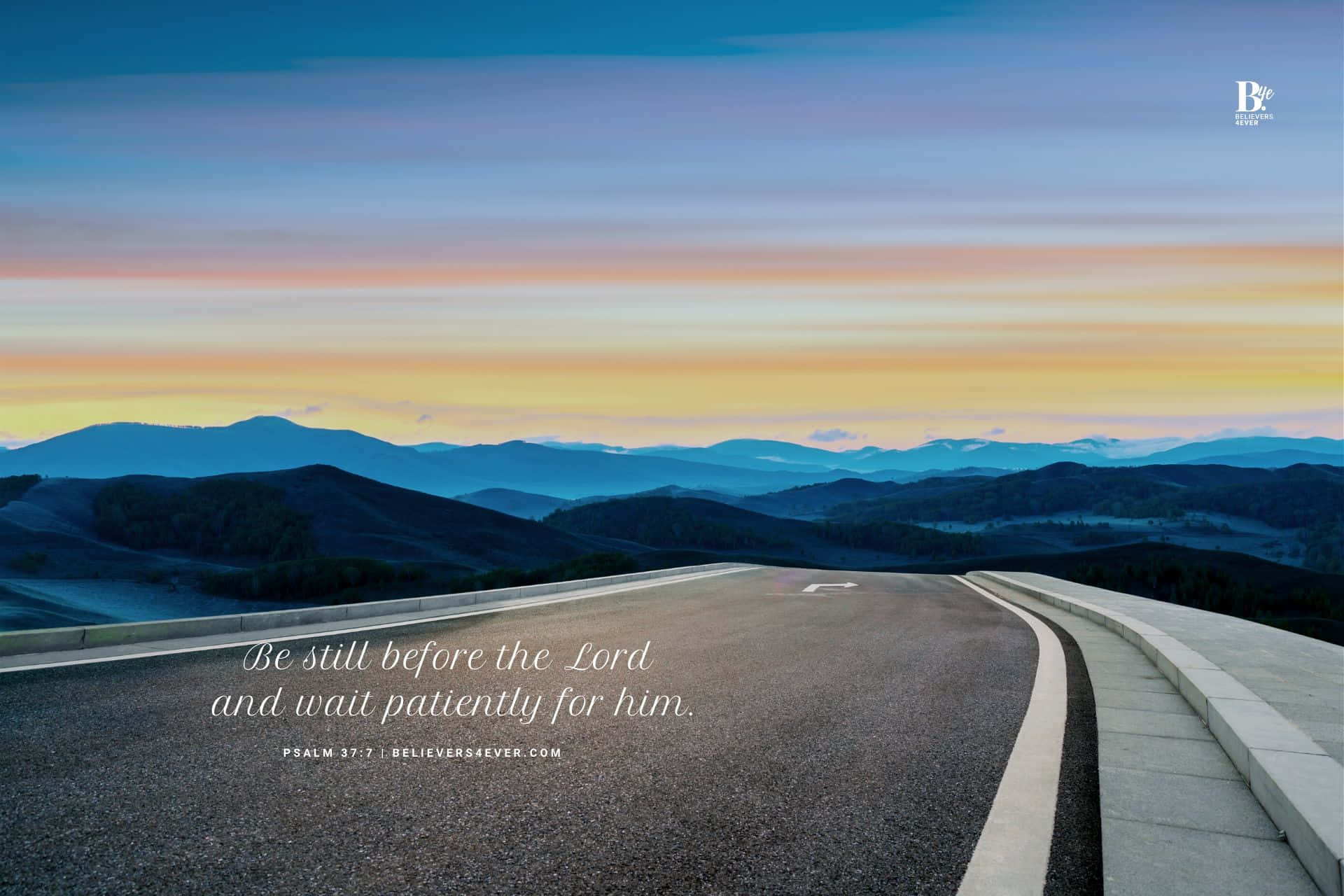 A Road With Mountains And A Quote Background