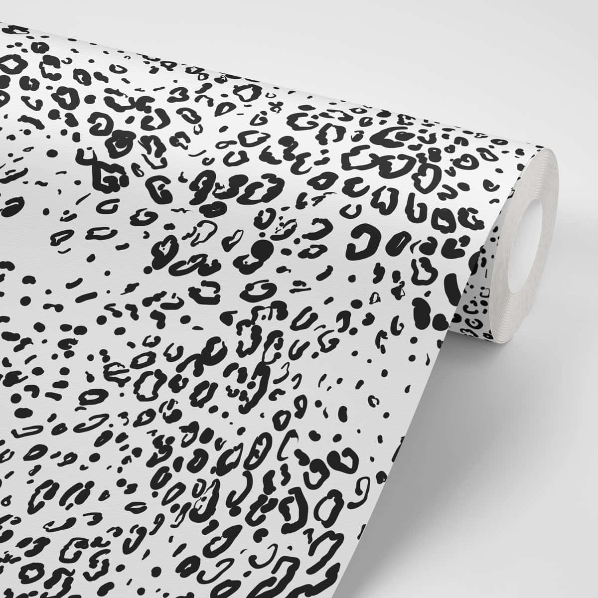 A Roll Of Black And White Leopard Print Wallpaper Background