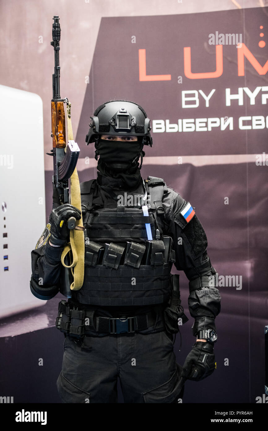 A Russian Soldier In A Uniform Stands In Front Of A Display Of A - Stock Image Background