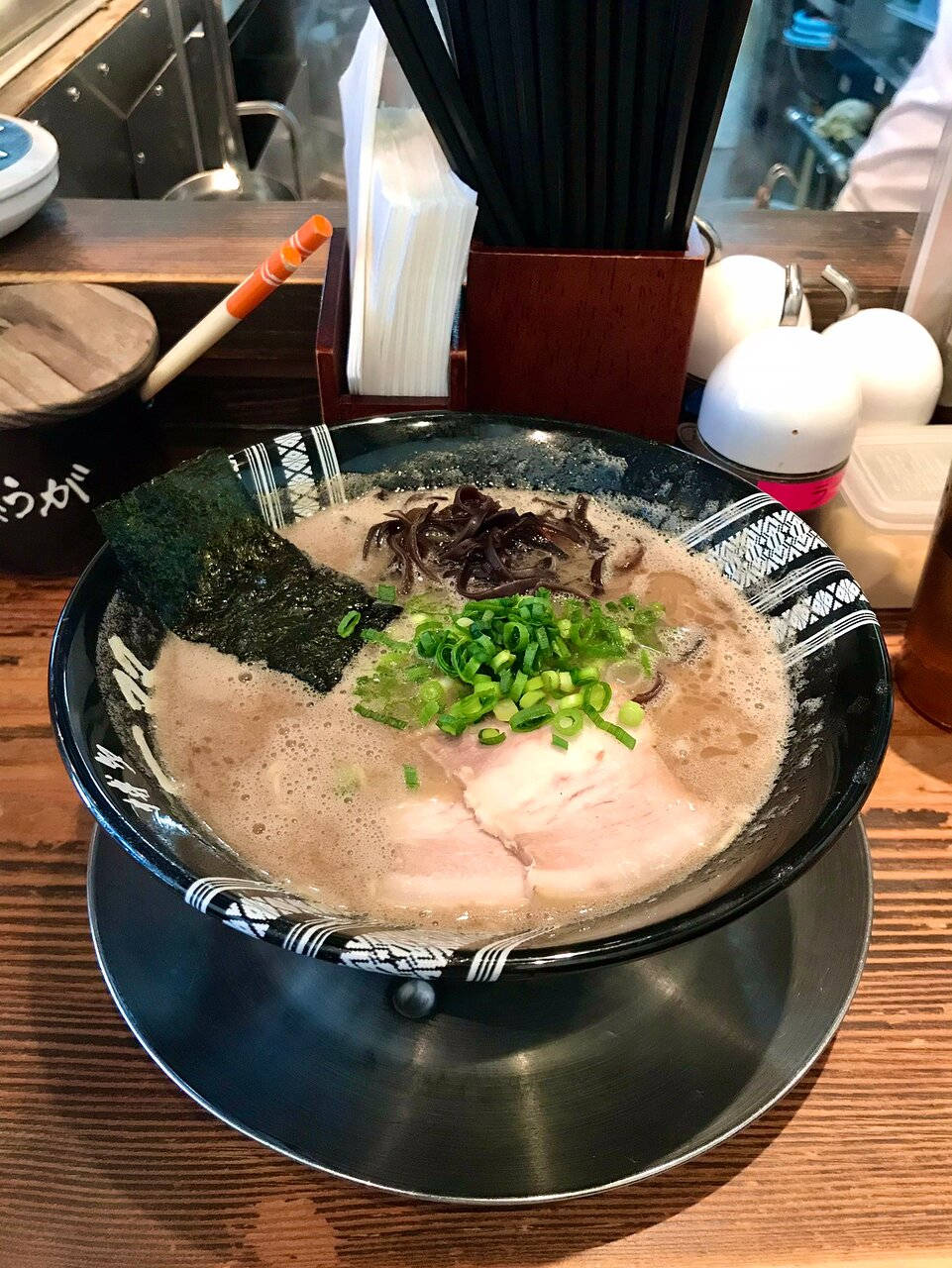 A Savory Dining Experience At A Hakata Ramen Restaurant Background