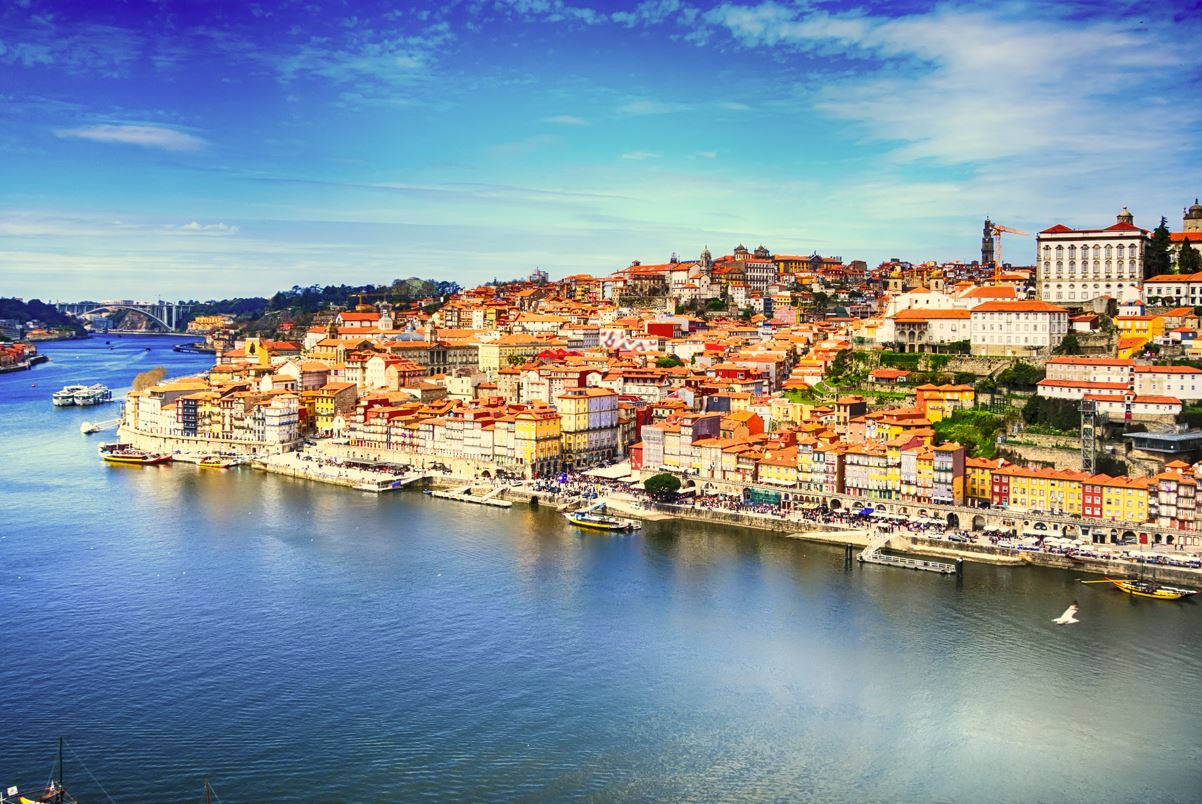 A Scenic View Of Lisbon Village By The Ocean