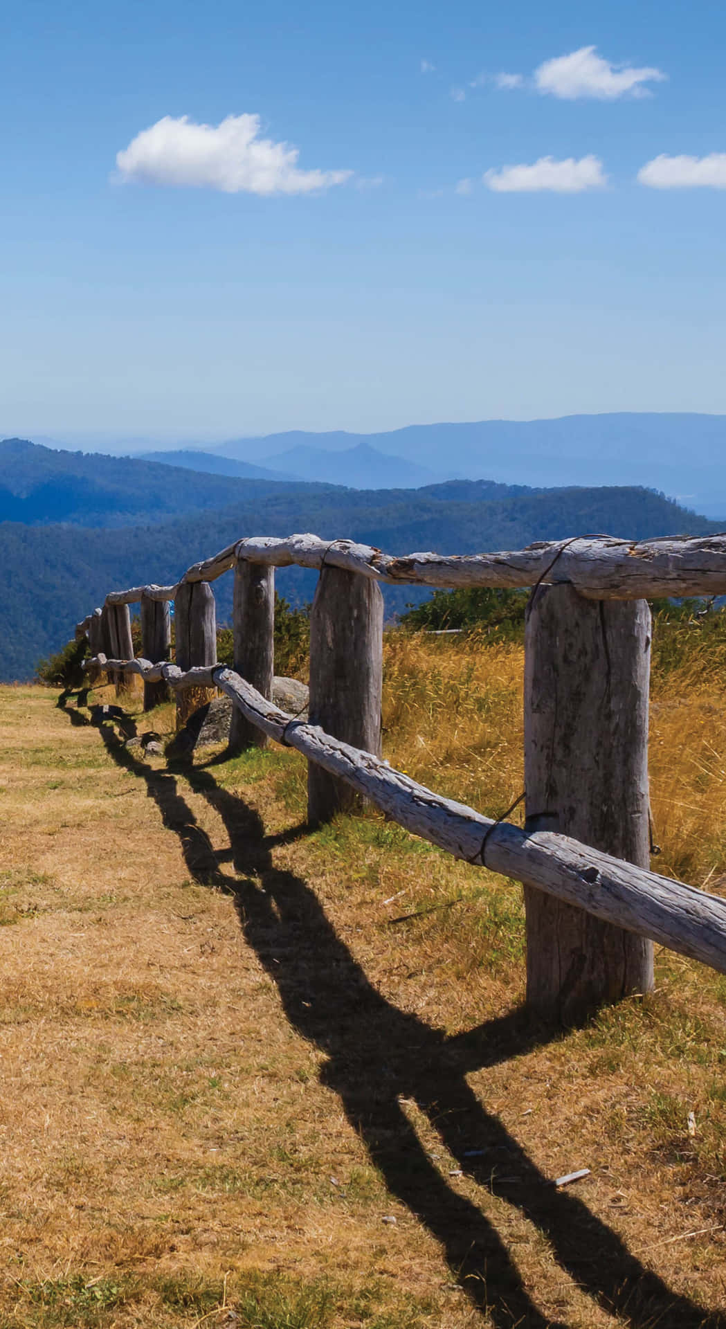 A Serene Rural View Surrounded By Nature Background