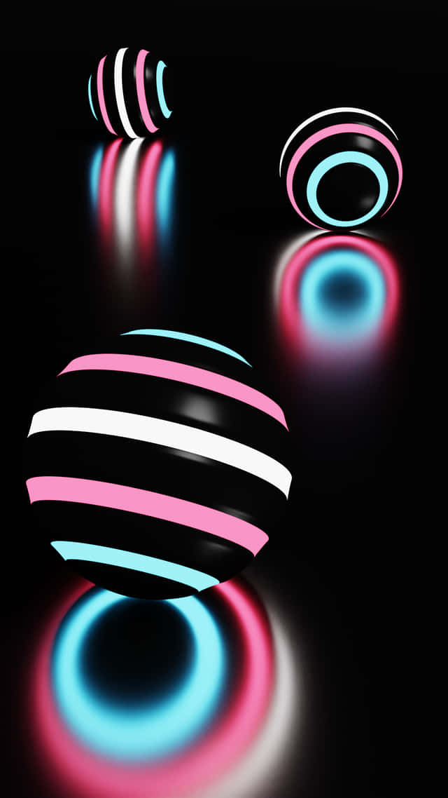 A Set Of Colorful Striped Balls On A Black Background