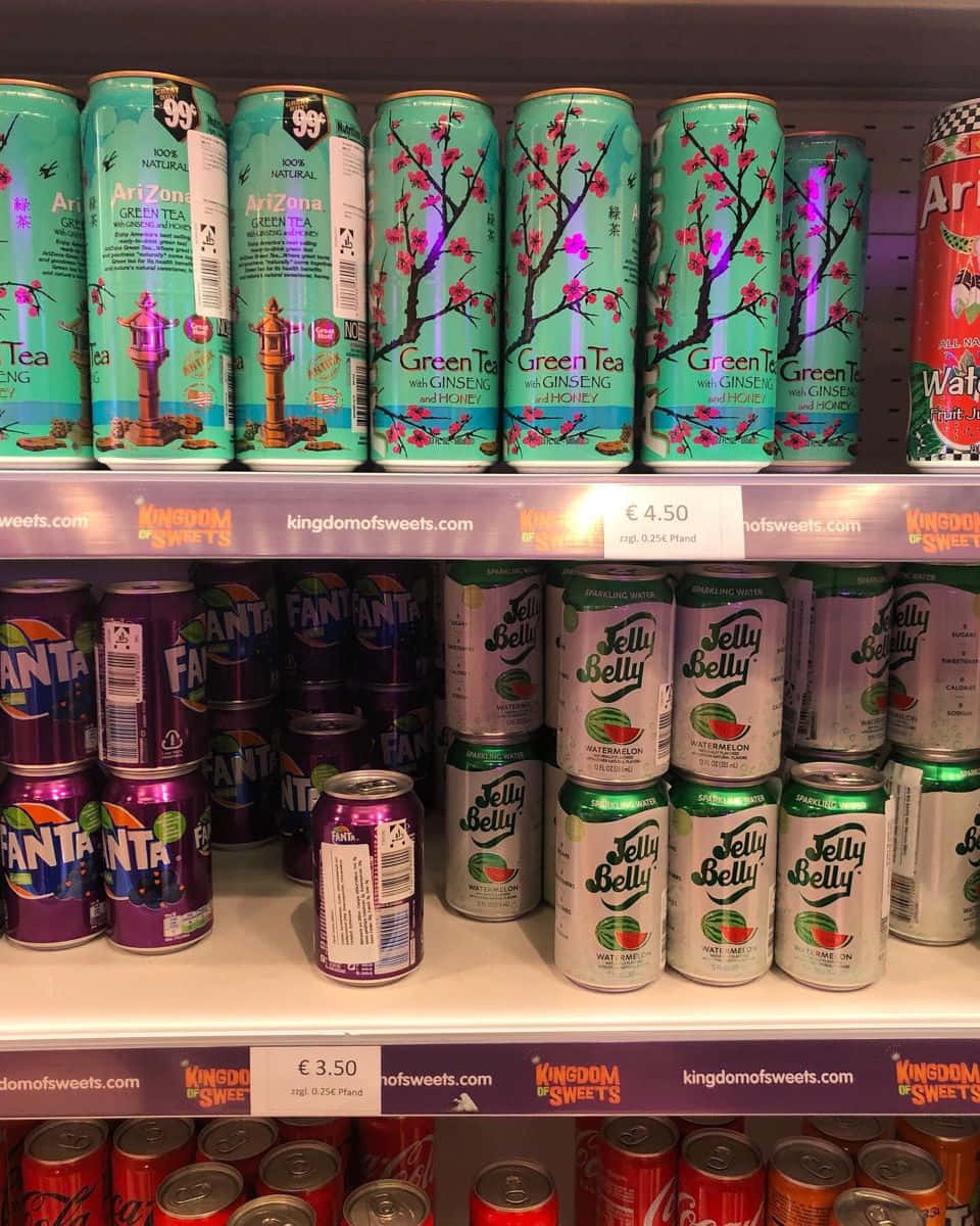 A Shelf Of Cans Of Soda Background
