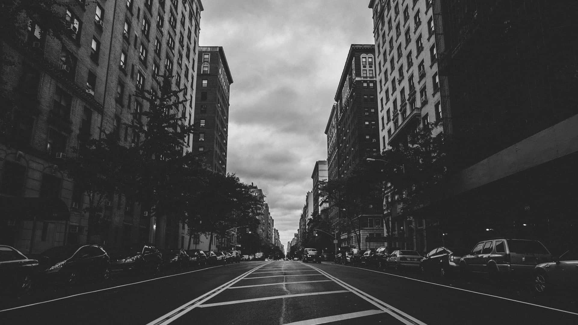 A Shimmering, Enchanting Black And White Cityscape. Background