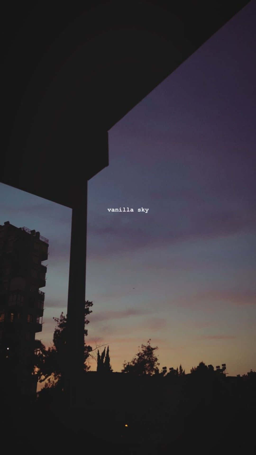 A Silhouette Of A Building With The Words'you're The One' Background