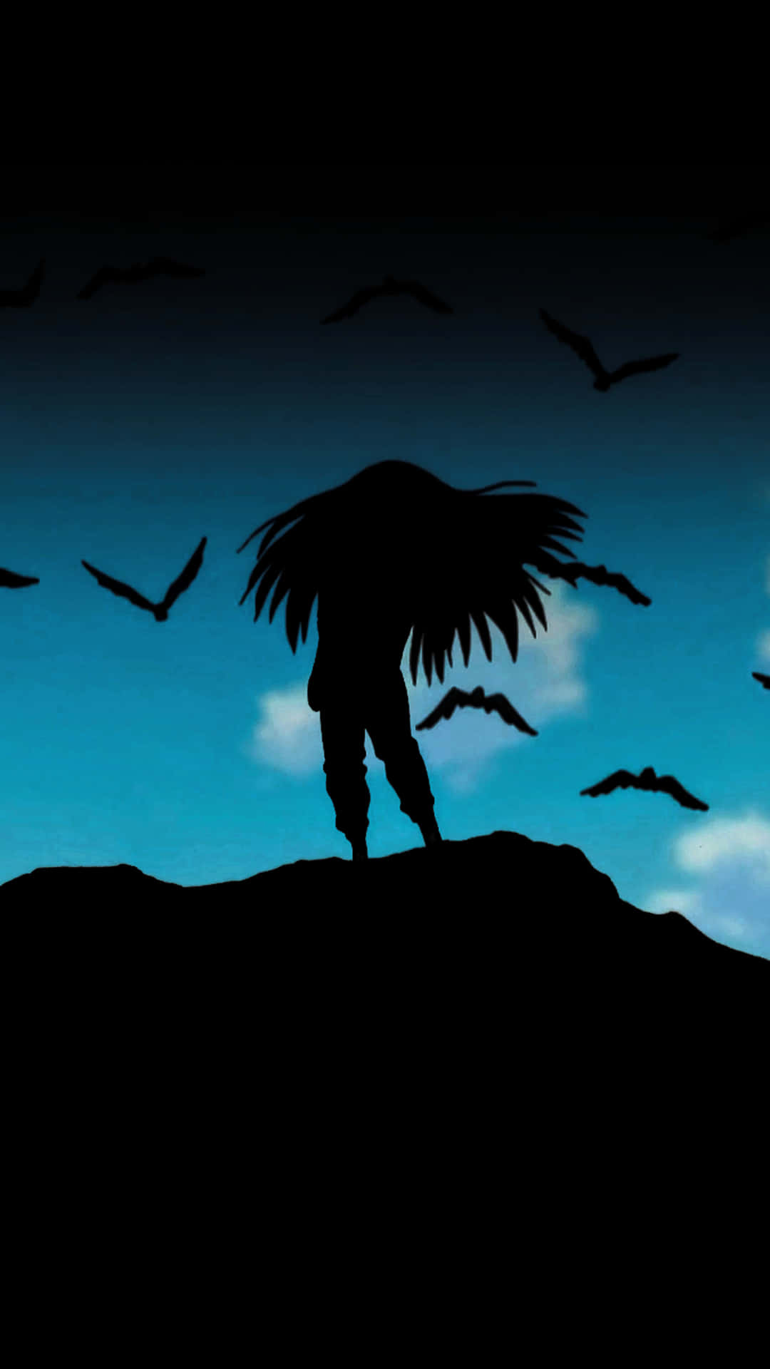 A Silhouette Of A Man With Long Hair Standing On A Hill Background