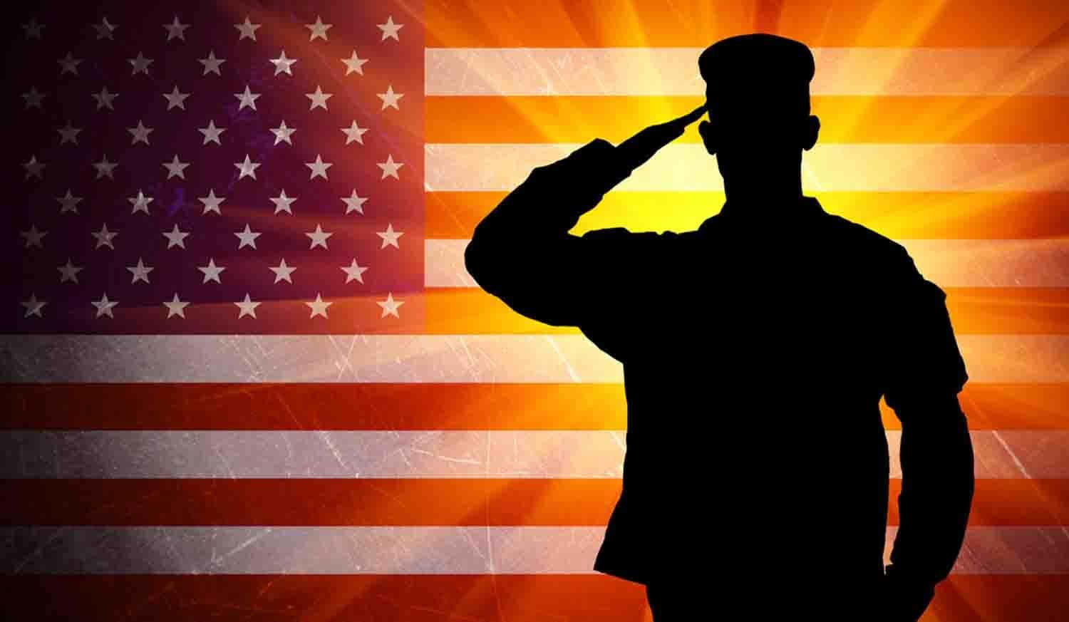 A Silhouette Of A Soldier Saluting In Front Of An American Flag Background