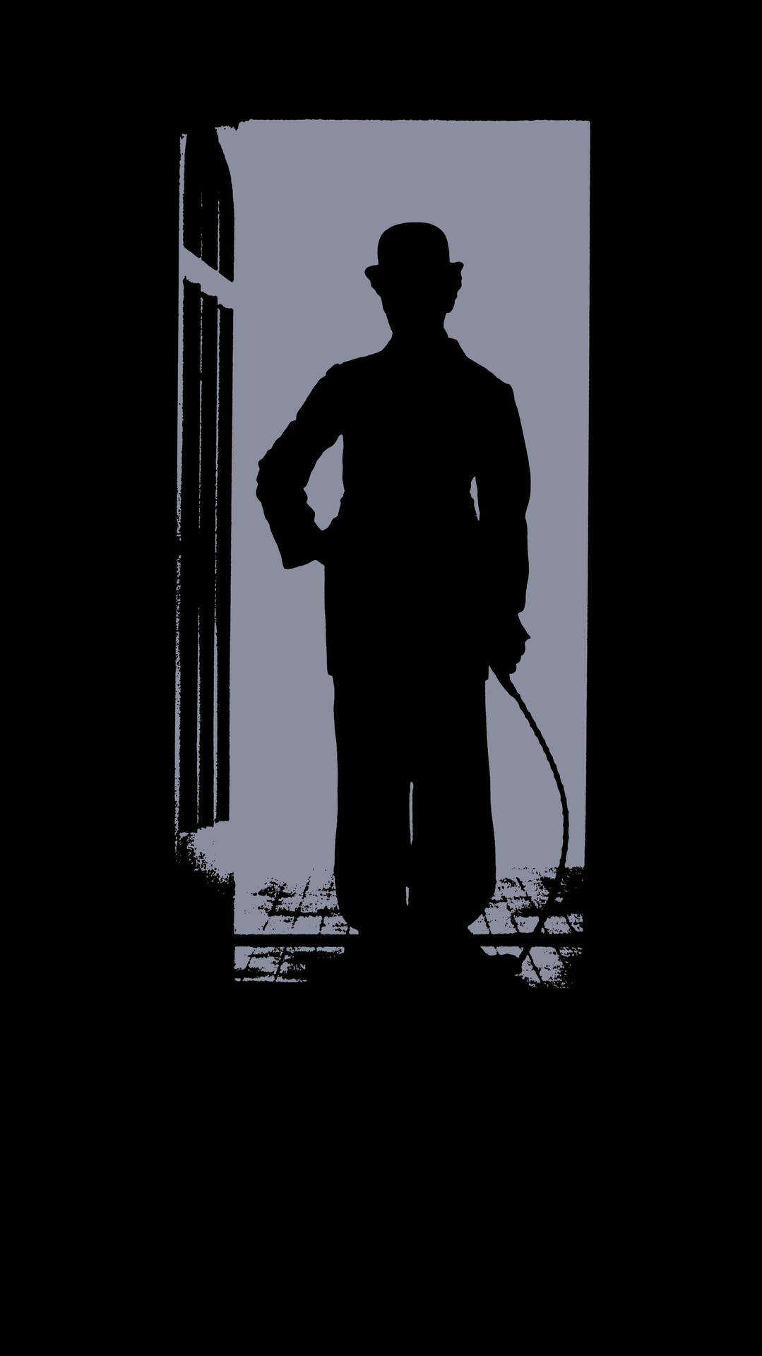 A Silhouette Of Charlie Chaplin In Front Of A Door Background