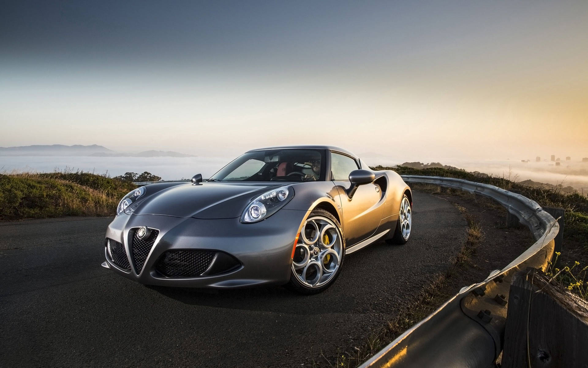 A Silver Alfa Romeo 4c At The Starting Line Background