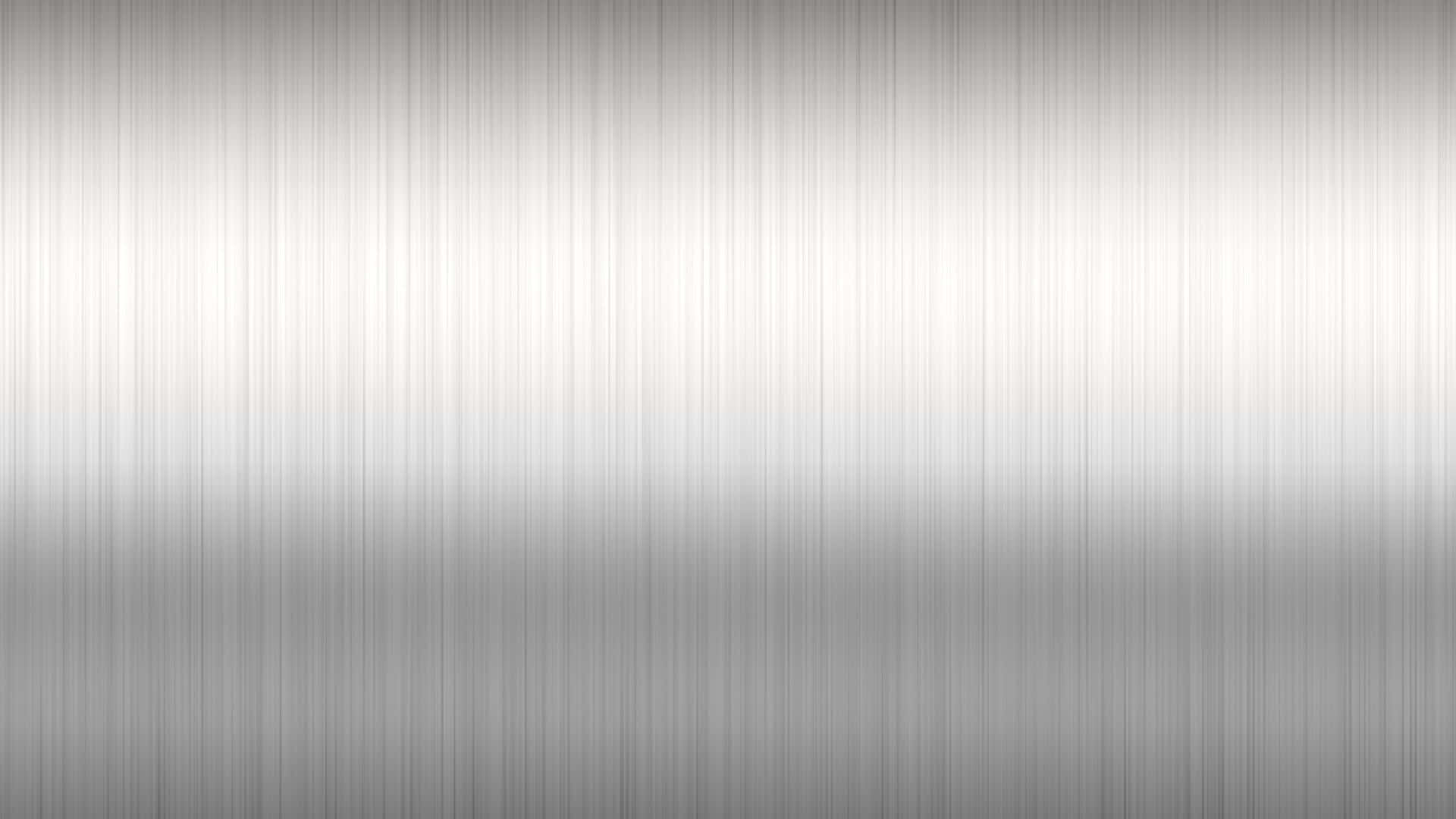 A Silver Metal Background With A Brushed Texture