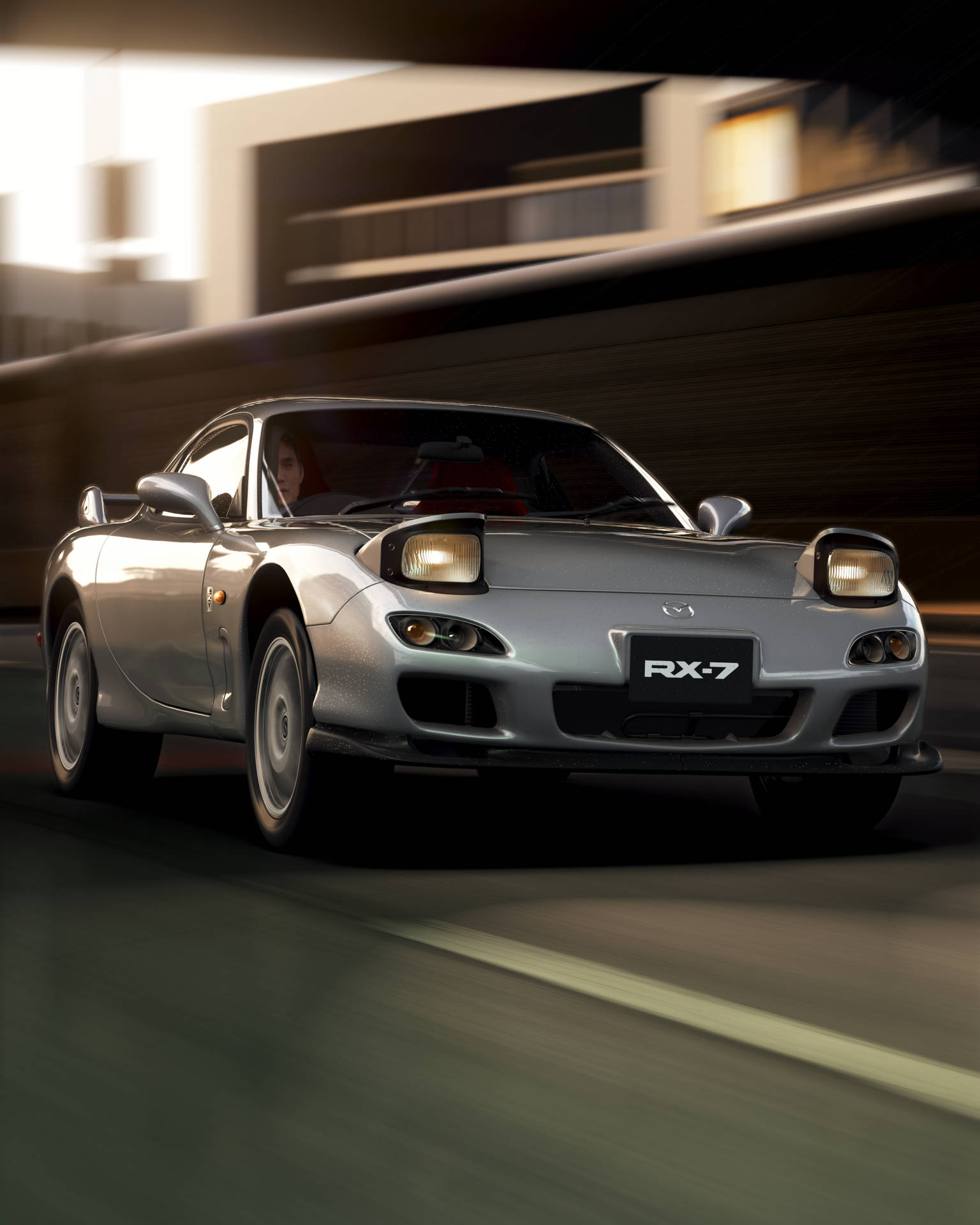 A Silver Sports Car Driving Down A Street Background