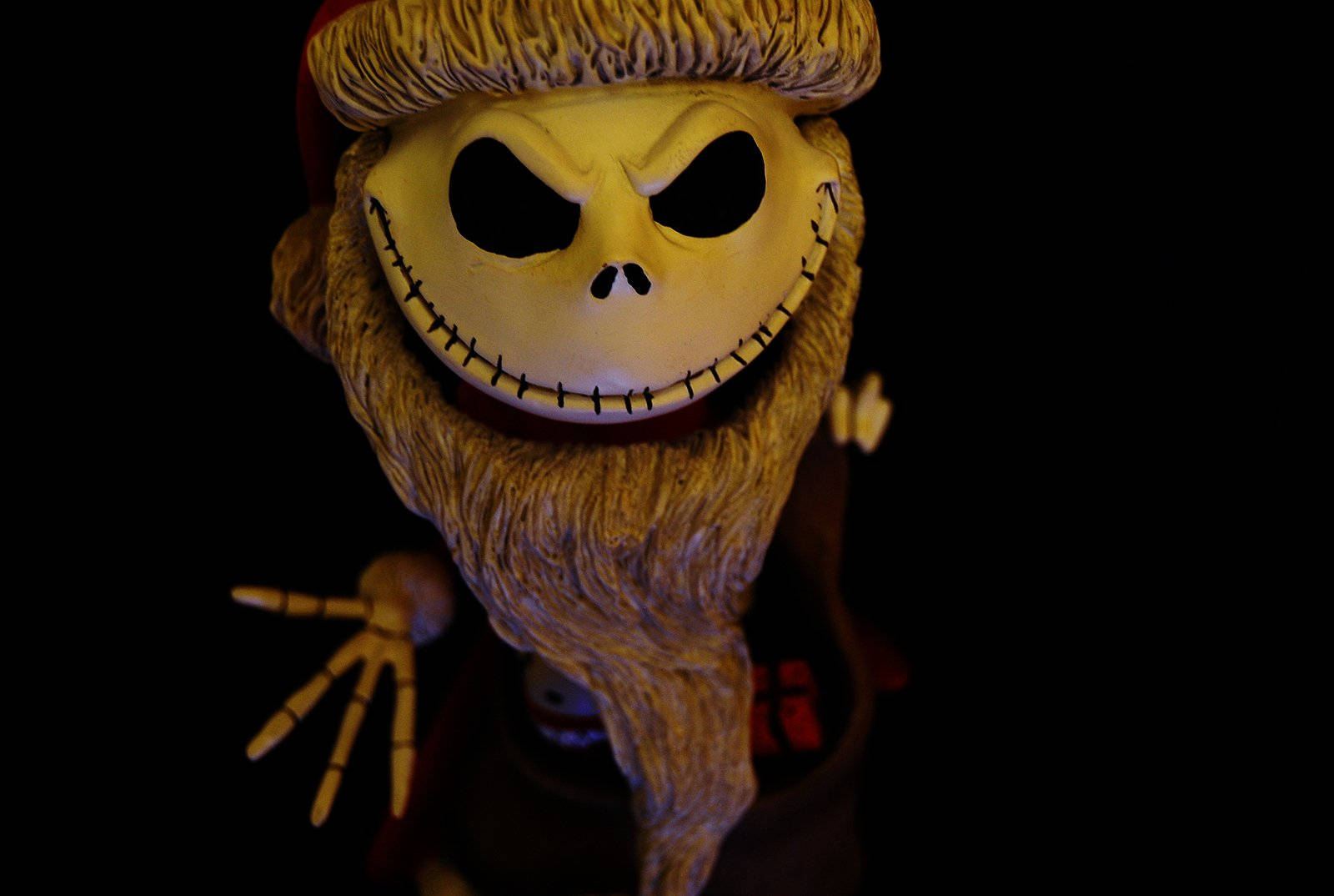 A Skeleton Figurine With A Hat And Beard Background