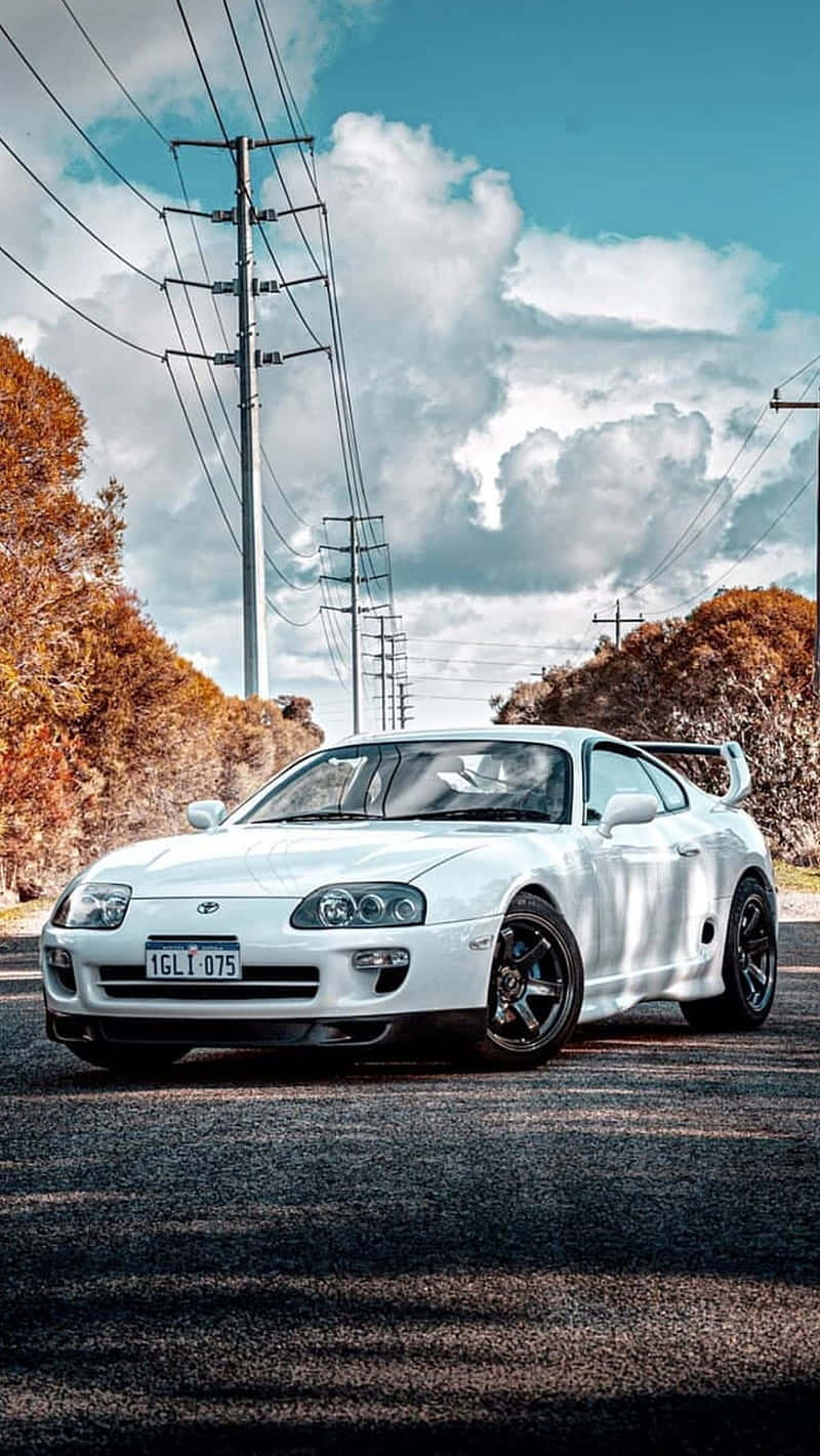 A Sleek And Powerful Toyota Supra. Background