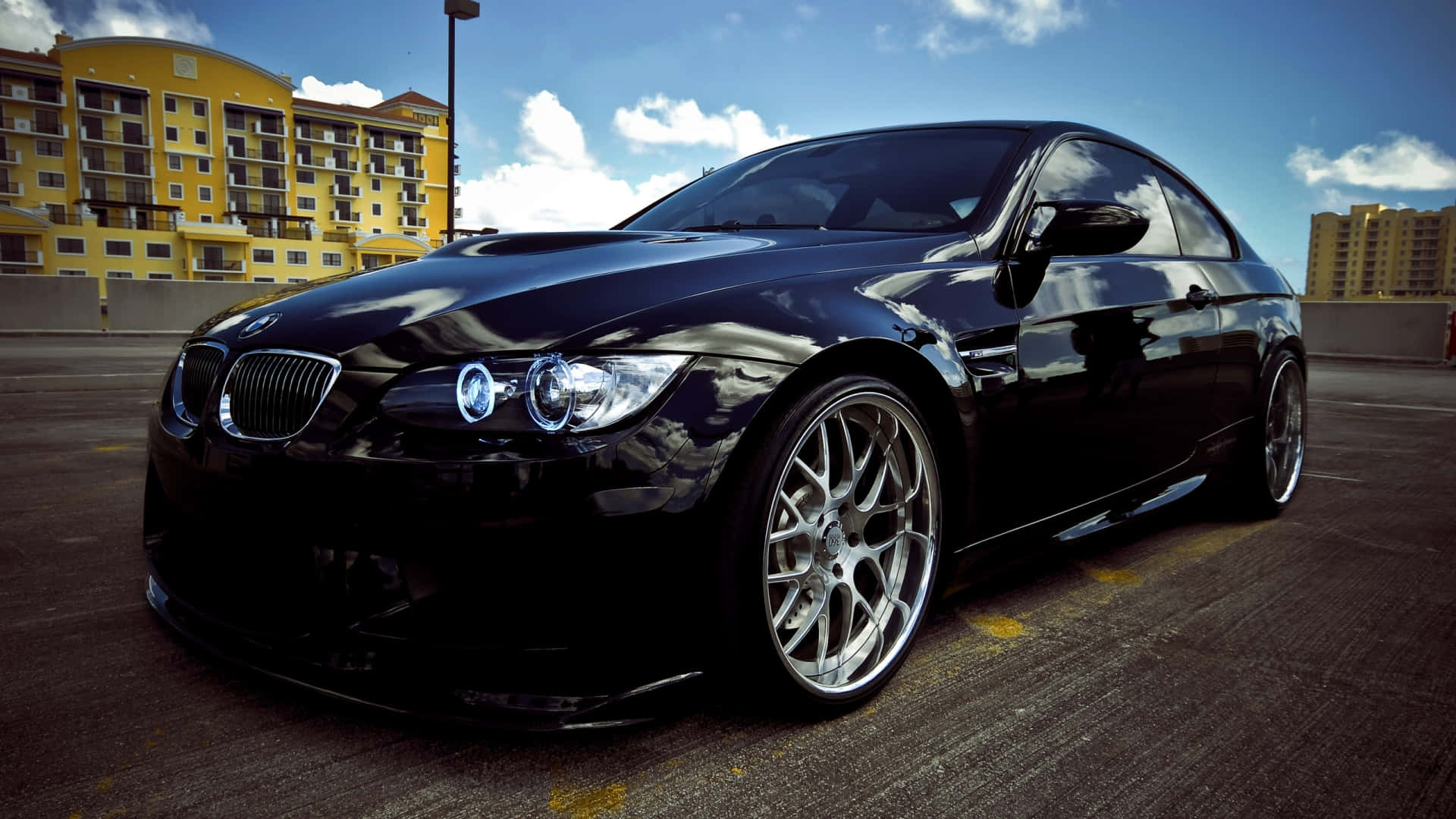 A Sleek And Stylish Bmw On The Open Road Background