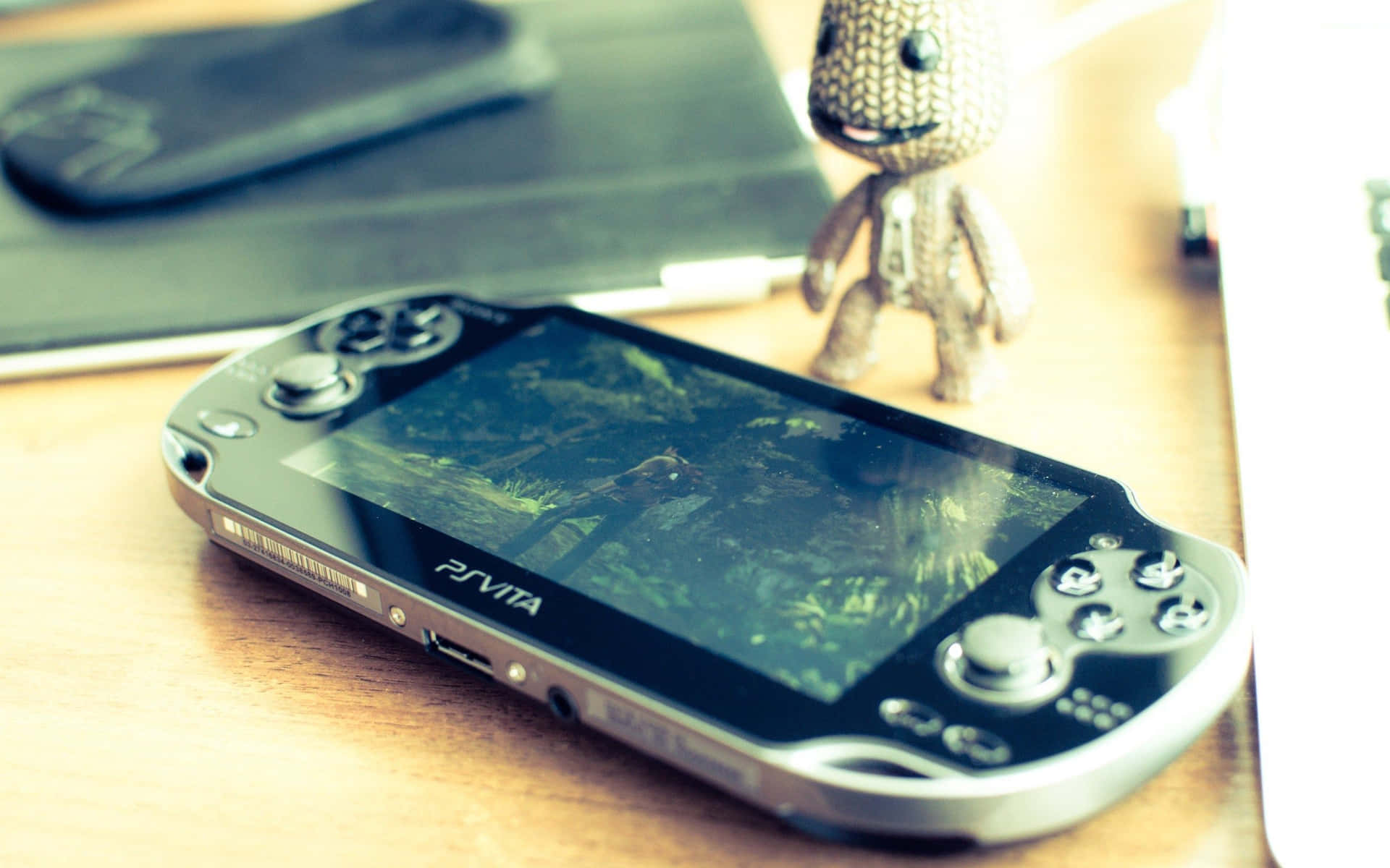 A Sleek Black Ps Vita In High Definition Background