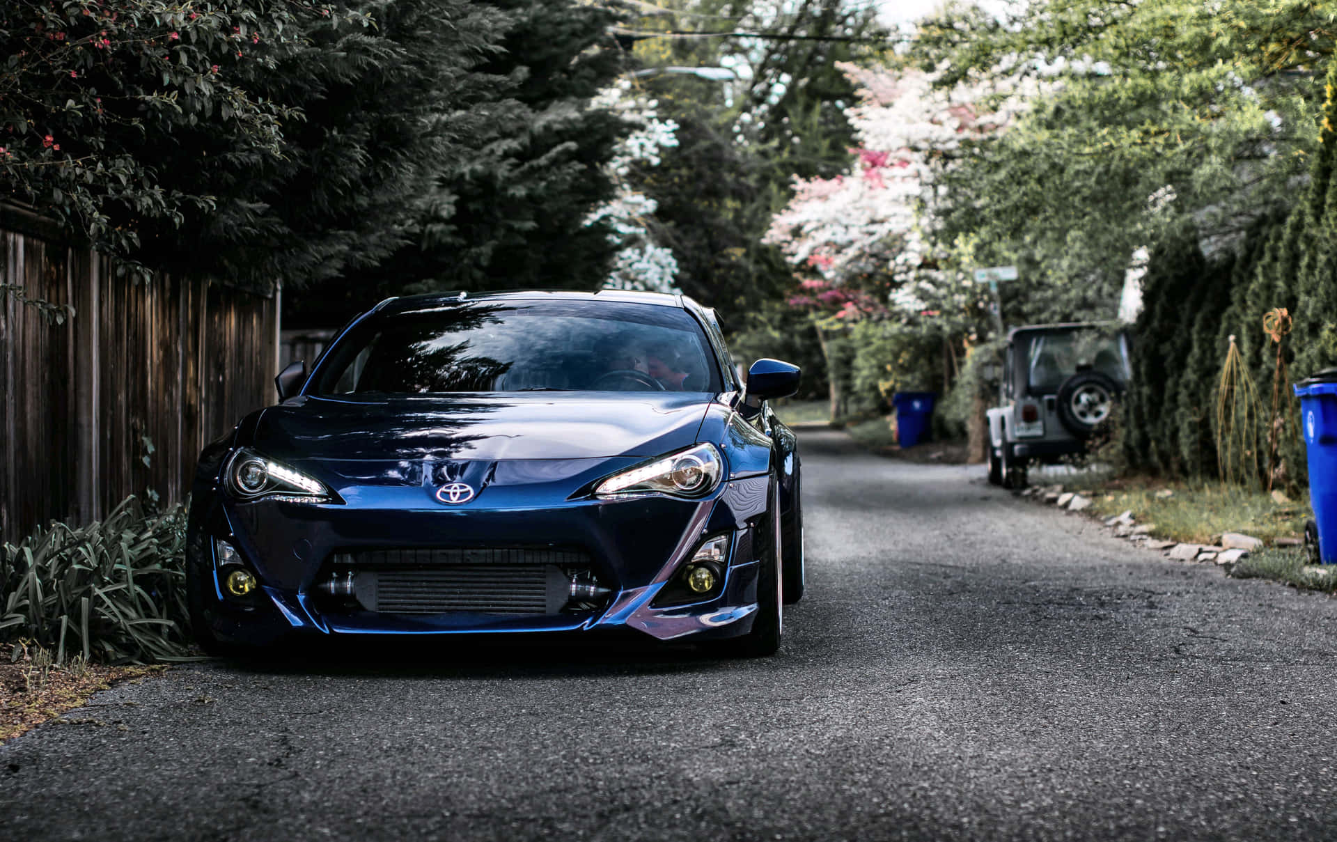A Sleek Toyota 86 With Matte Black Finish Background