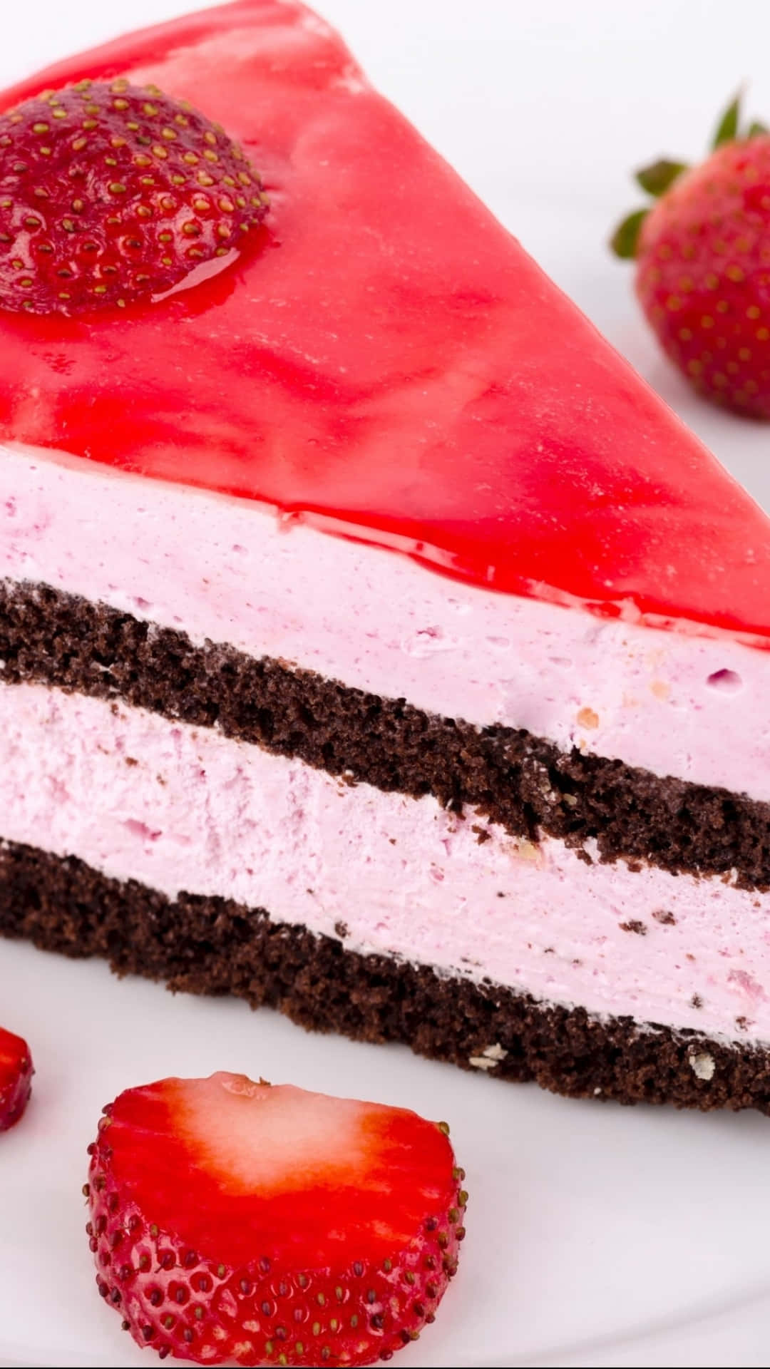 A Slice Of Strawberry Cake With Strawberries On Top Background