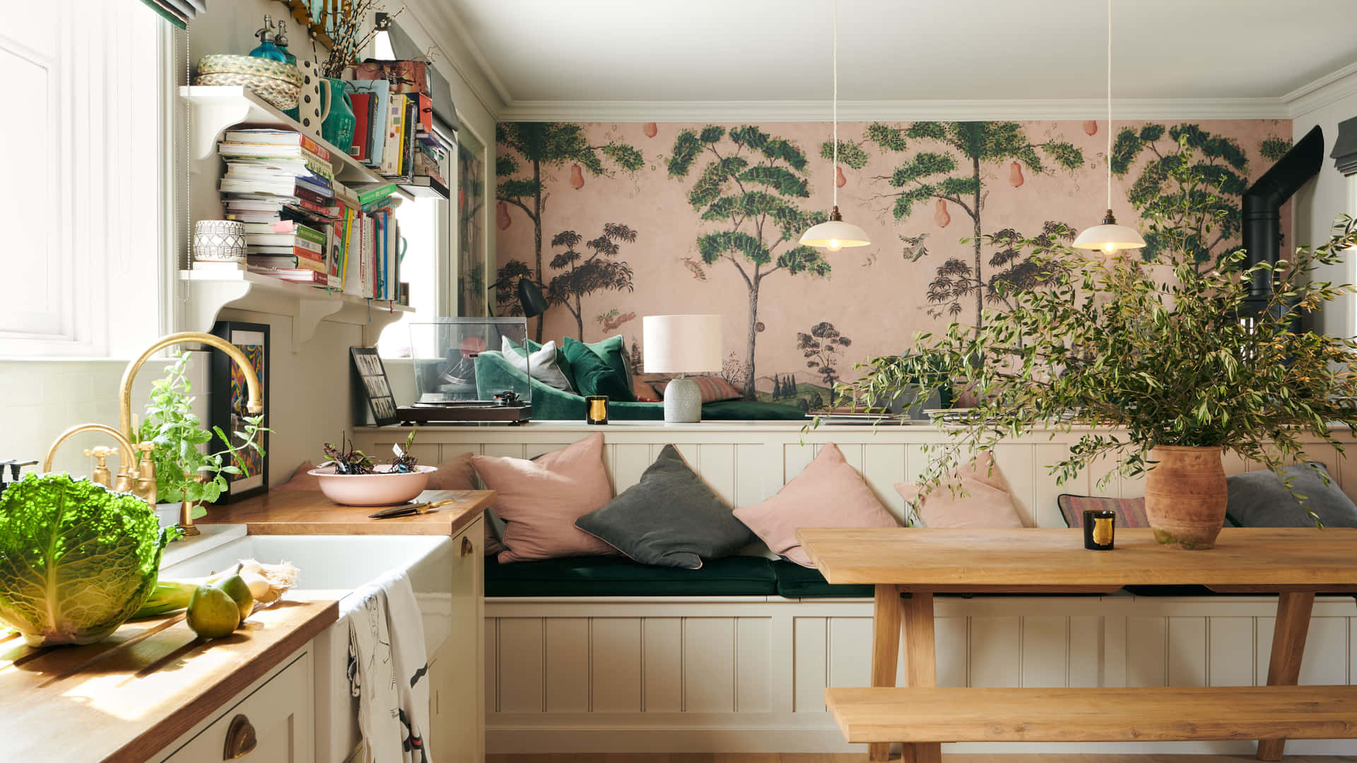 A Small Kitchen With A Bench And A Table Background