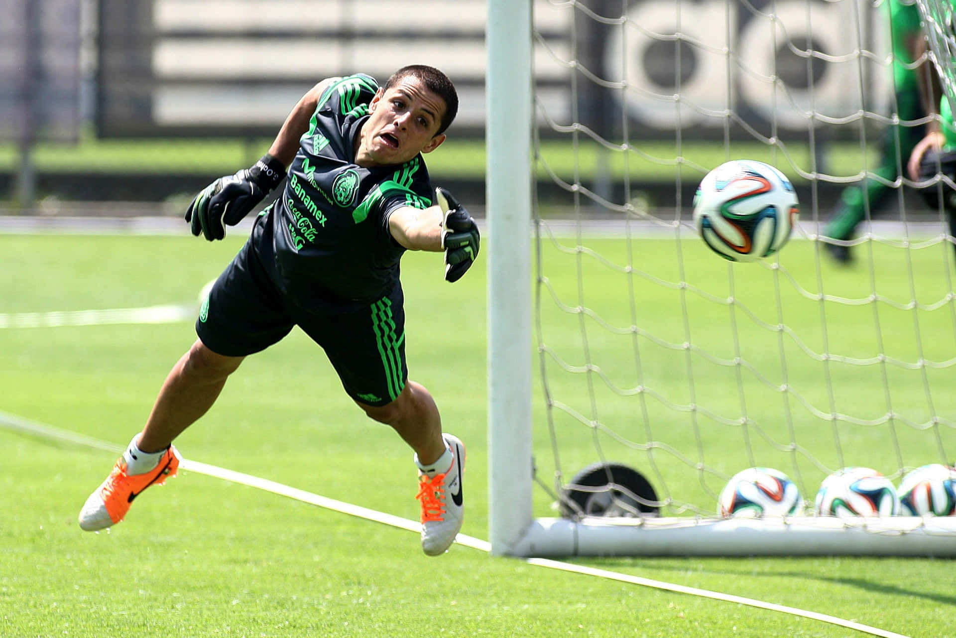 A Soccer Player Is In The Air Background