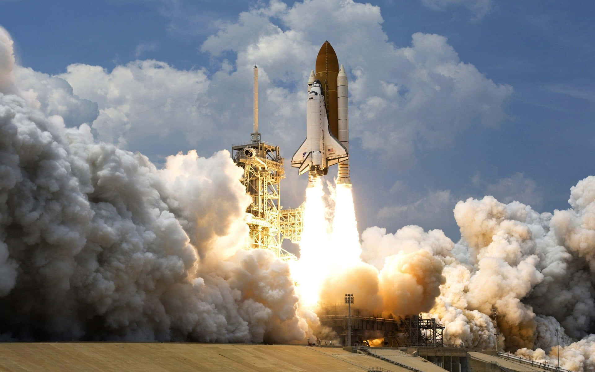 A Space Shuttle Is Taking Off With Smoke Coming Out Of It