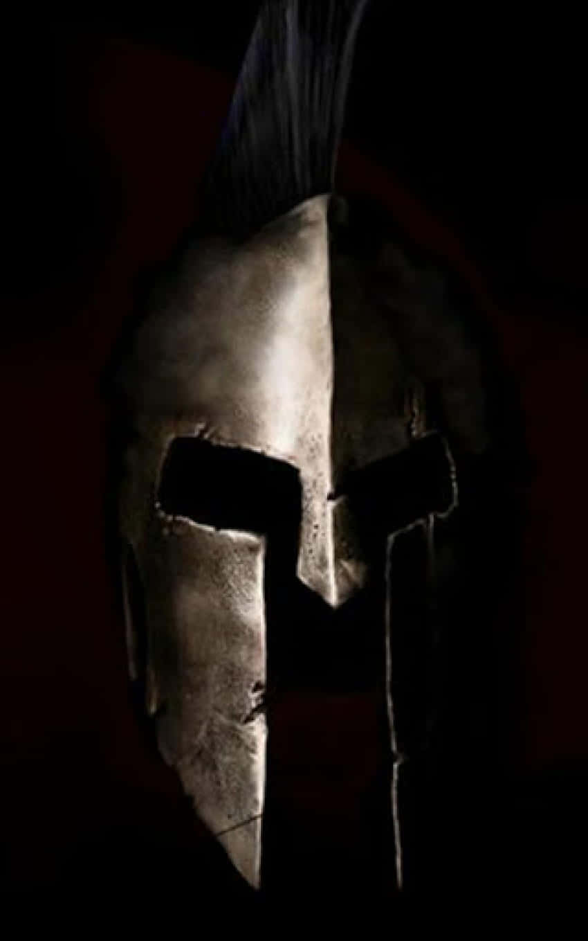 A Spartan Helmet With A Black Background