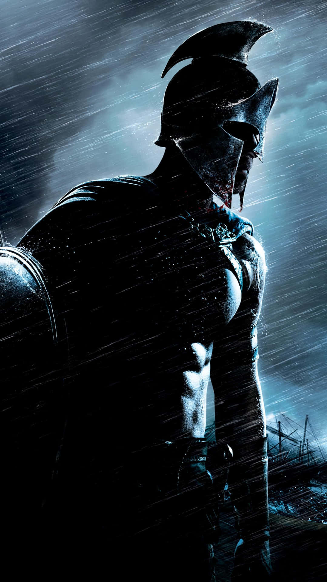 A Spartan Standing In The Rain Background