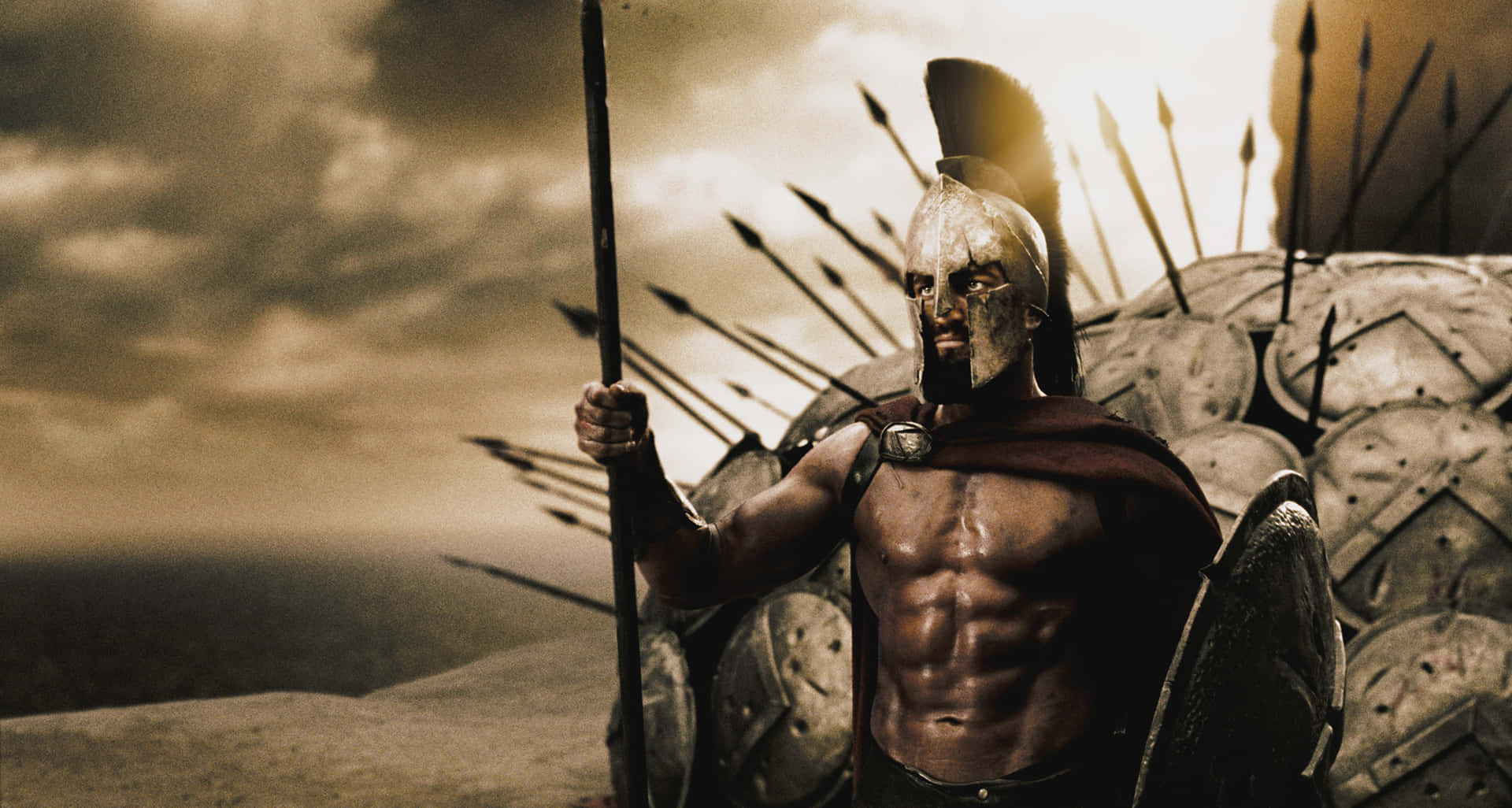 A Spartan Warrior Standing On A Hill Background