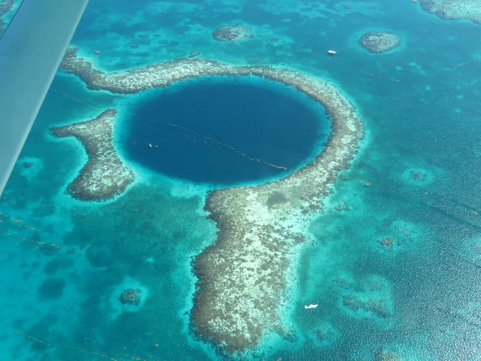 A Spectacular Aerial View Of The Great Blue Hole Background