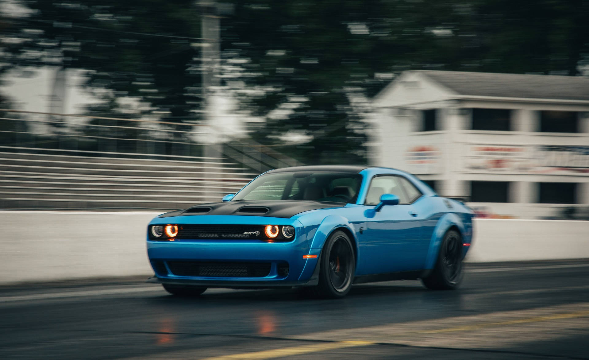 A Speeding Blue Dodge Challenger