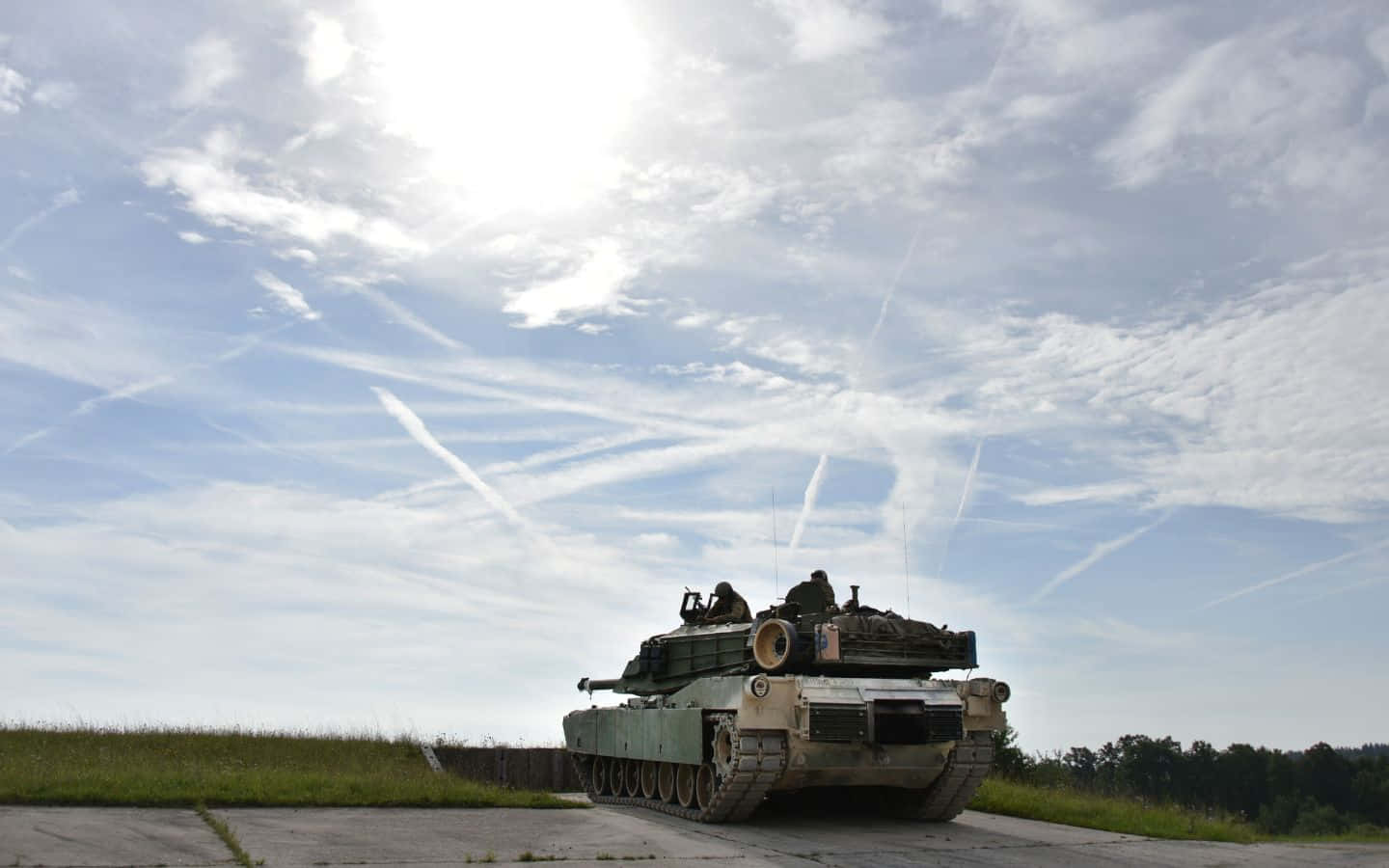 A Squadron Of Armored Tanks In A Desert Environment Background