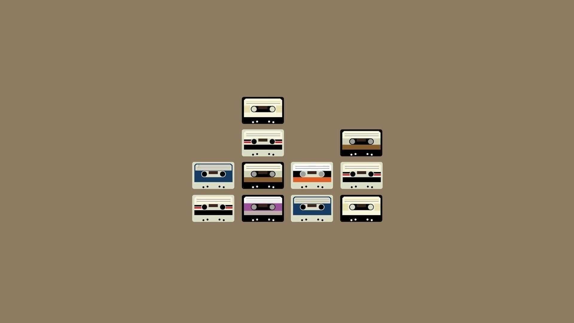 A Stack Of Cassette Tapes On A Brown Background Background