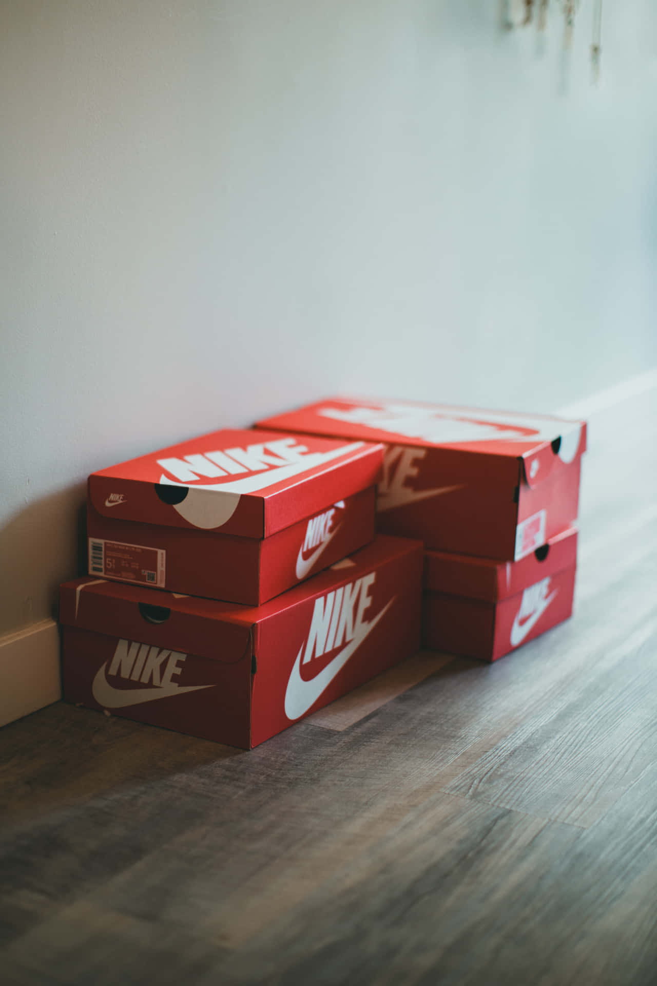 A Stack Of Nike Boxes