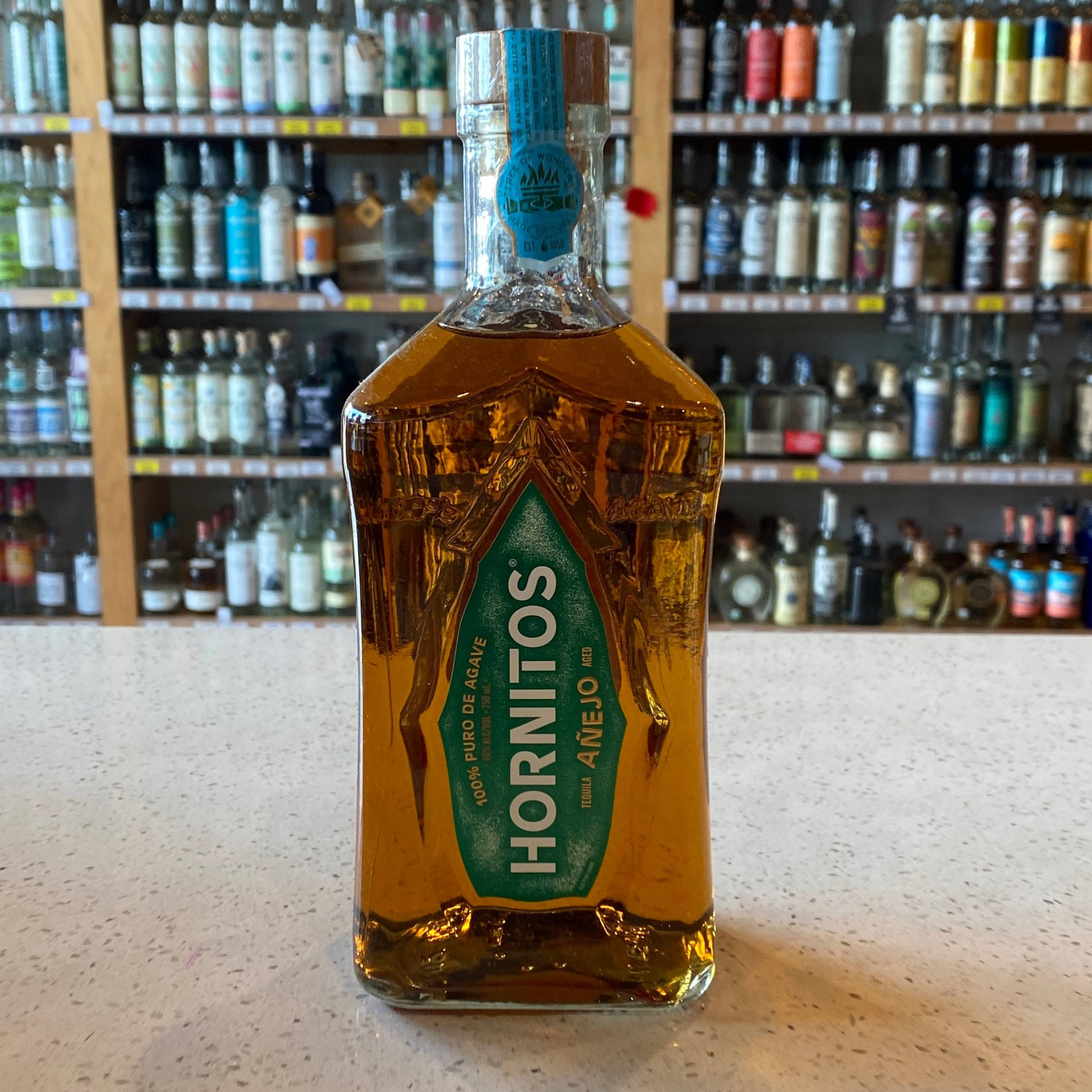 A Stacked Assortment Of Hornitos Tequila Añejo Blend