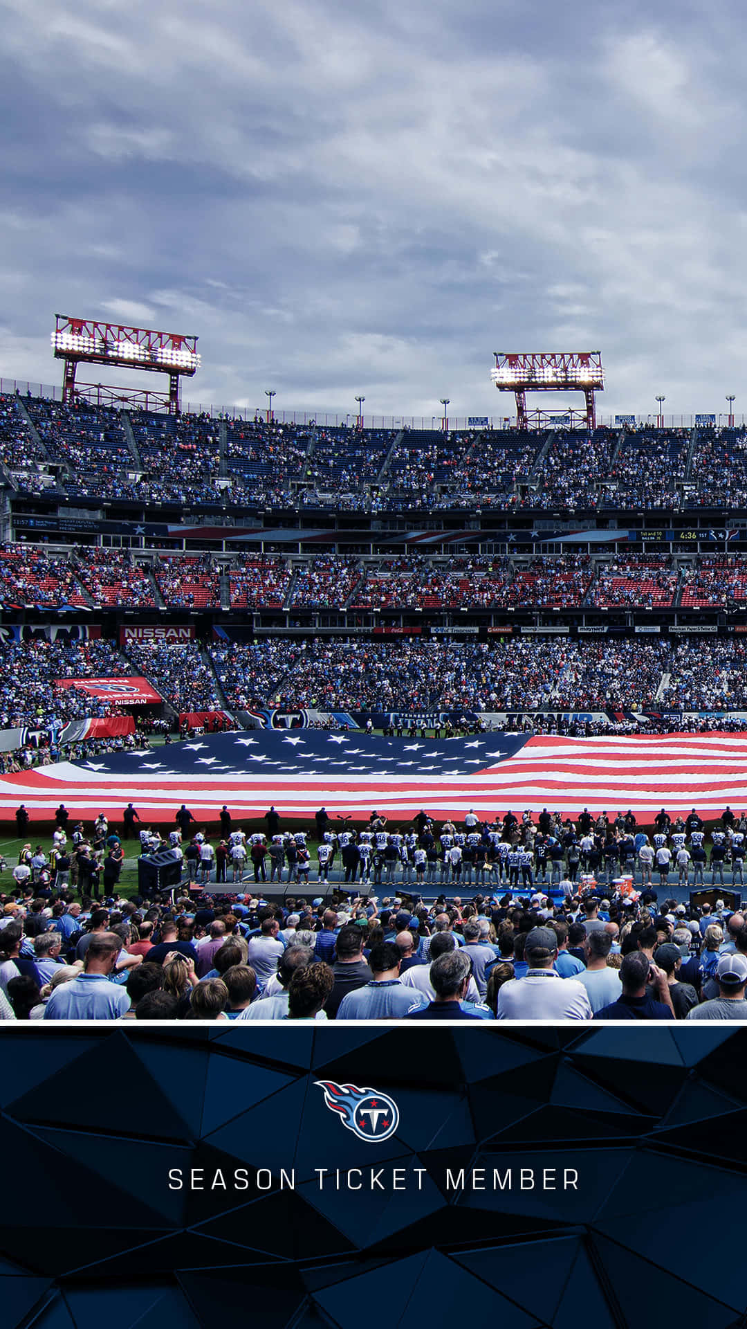 A Stadium With A Large American Flag