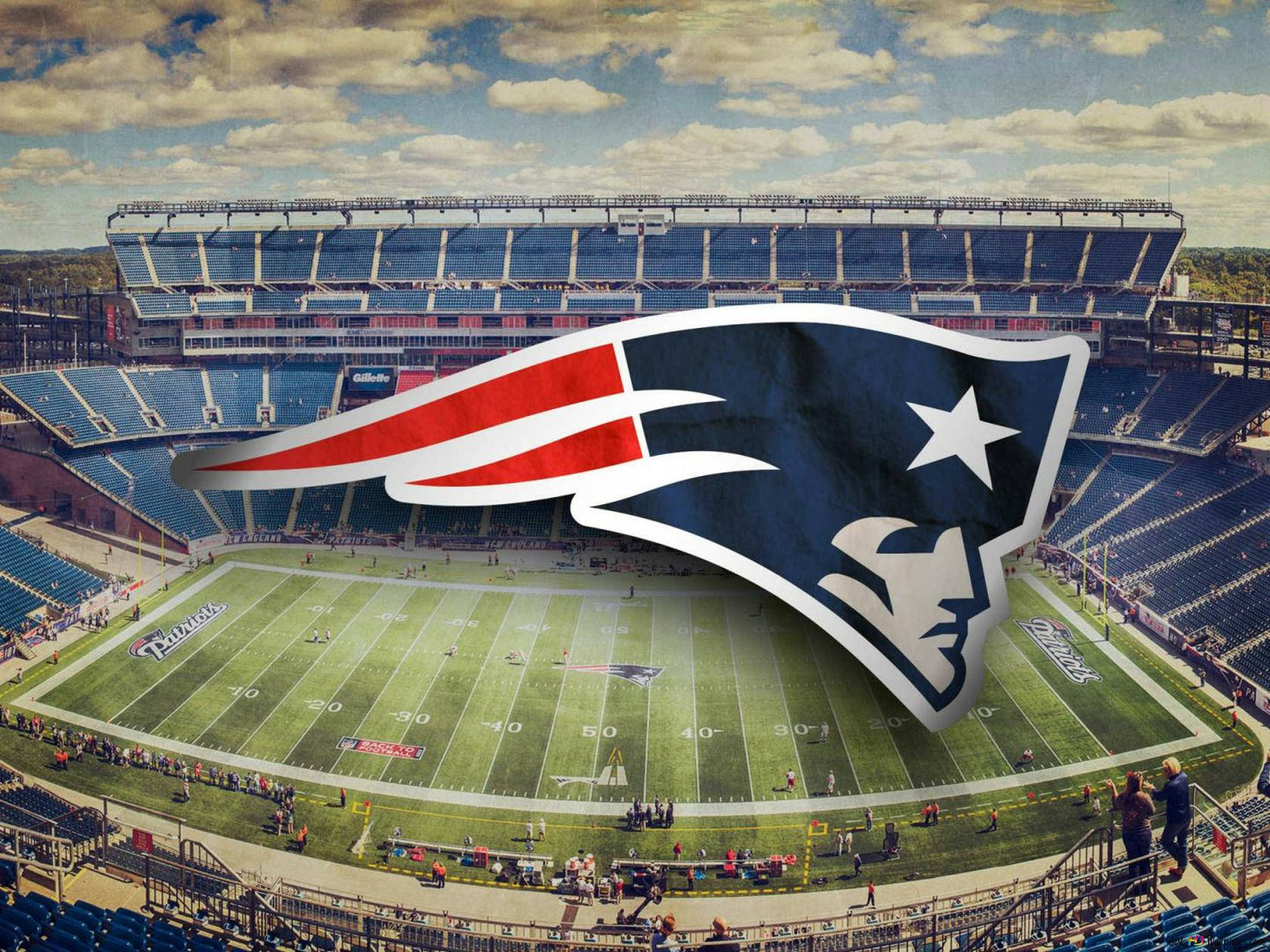 A Stadium With The New England Patriots Logo Background