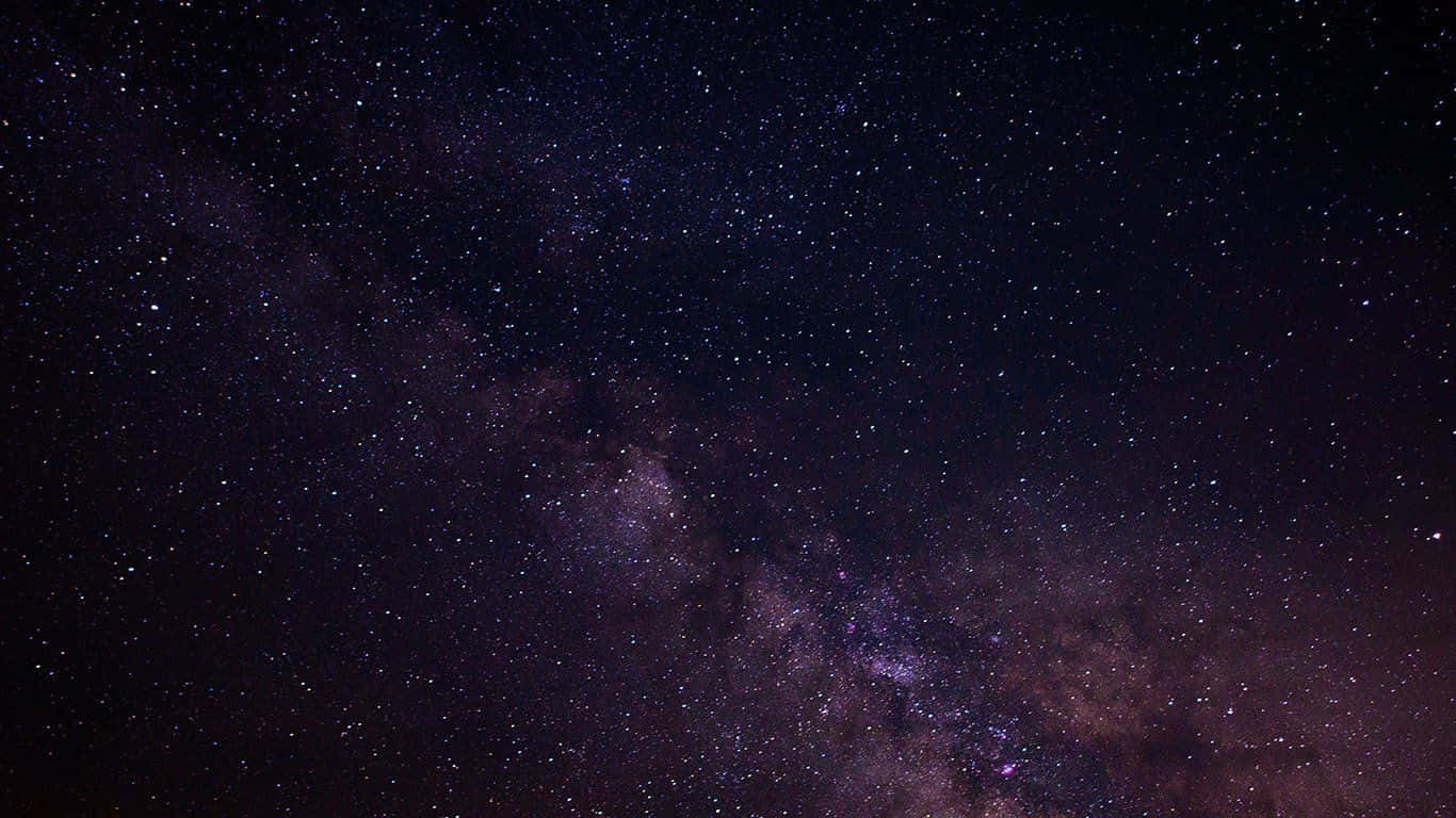 A Starry Sky With A Milky Background