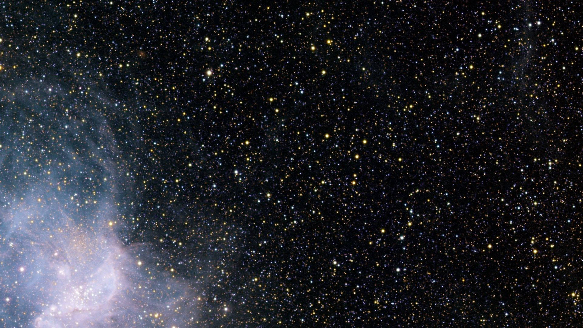 A Starry Sky With A Nebula Background
