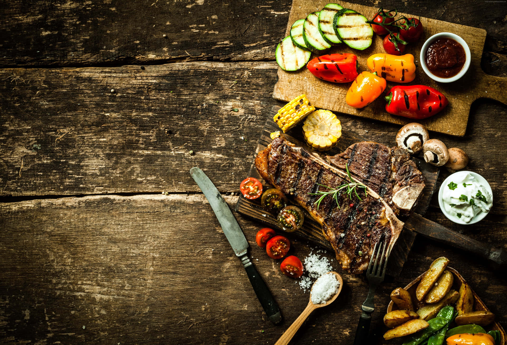 A Steak On A Wooden Cutting Board Background