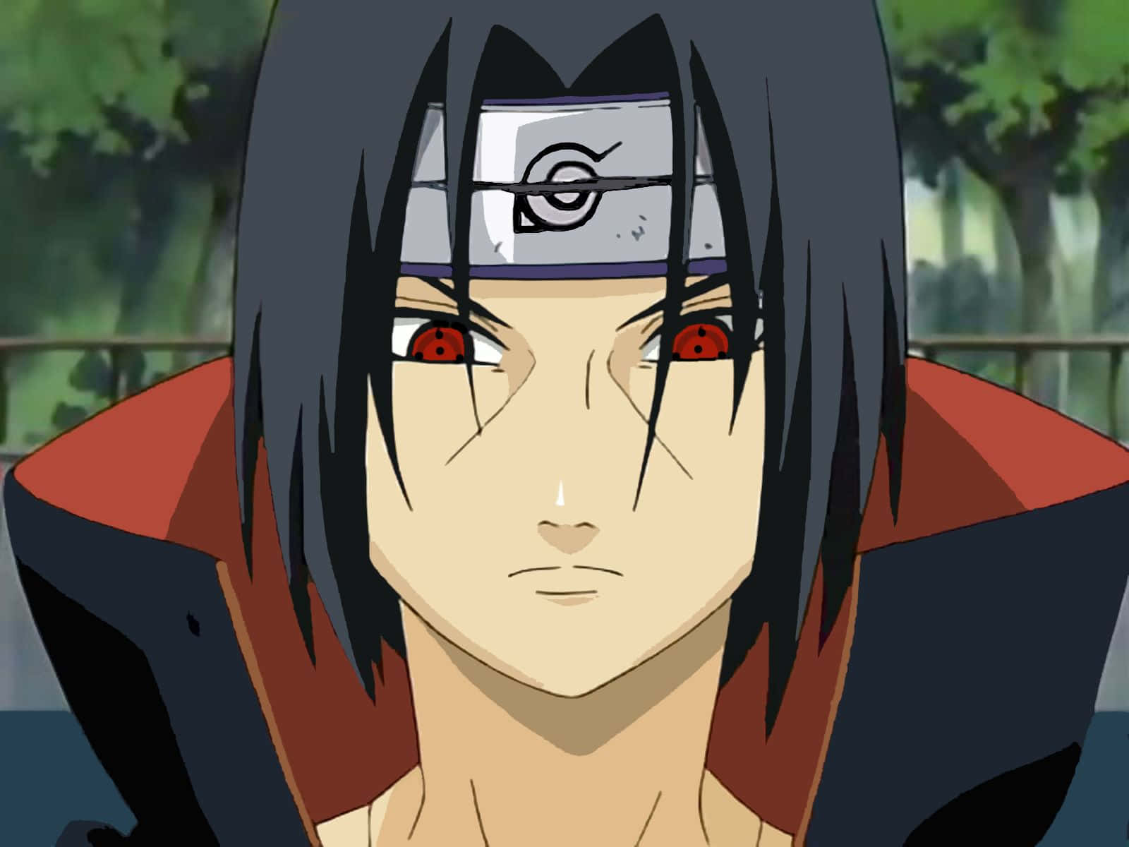 A Stoic Yet Determined Look On Itachi's Face Background