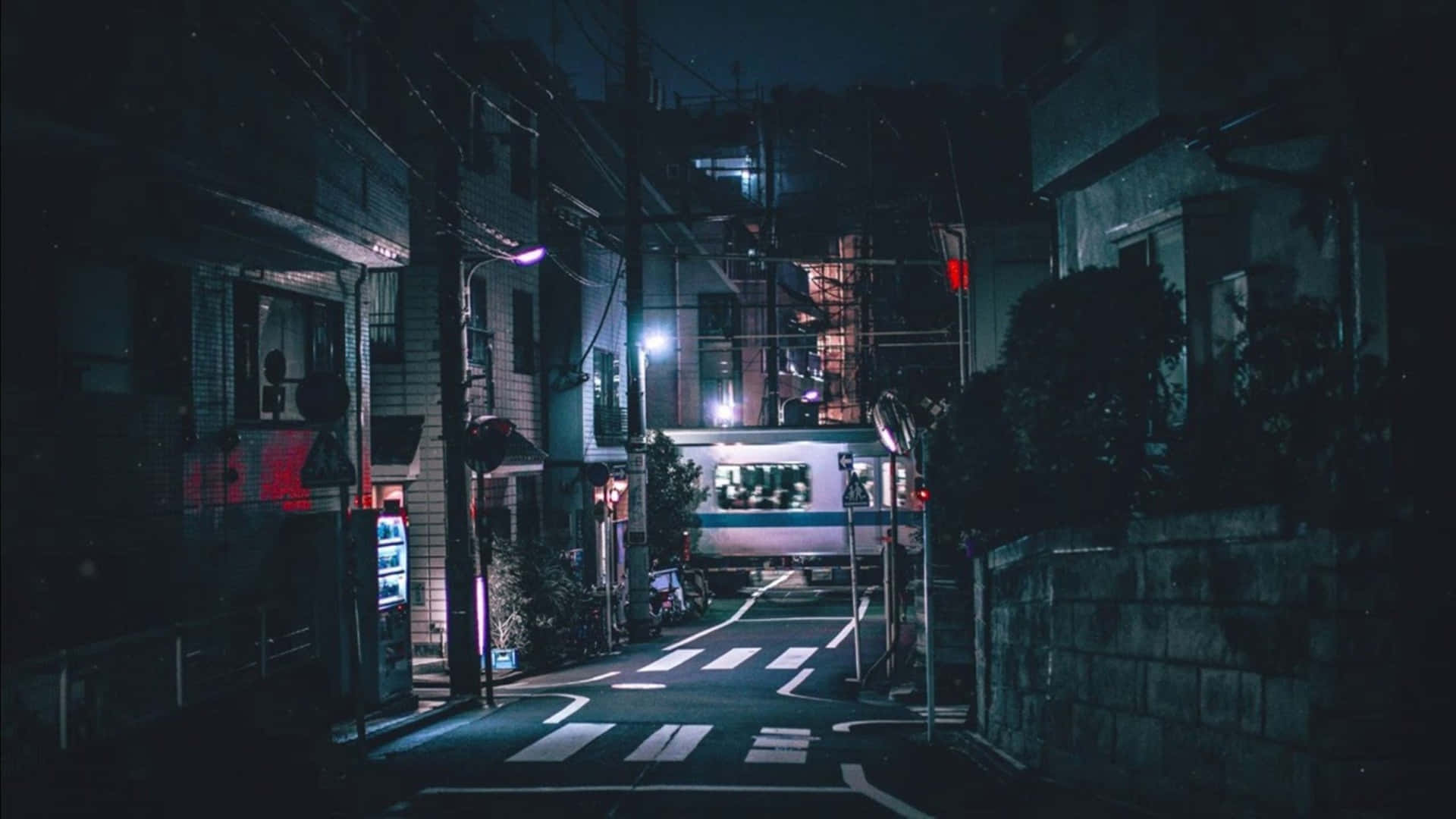 A Street In Tokyo At Night Background