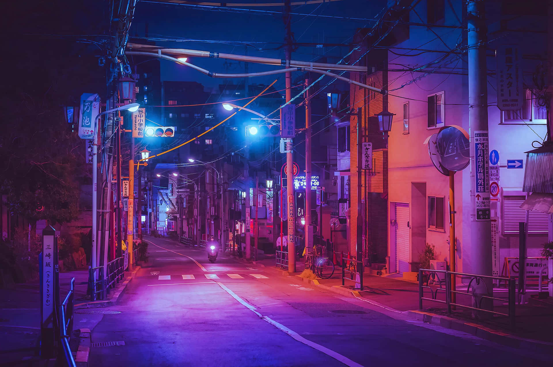 A Street In Tokyo At Night With Neon Lights Background
