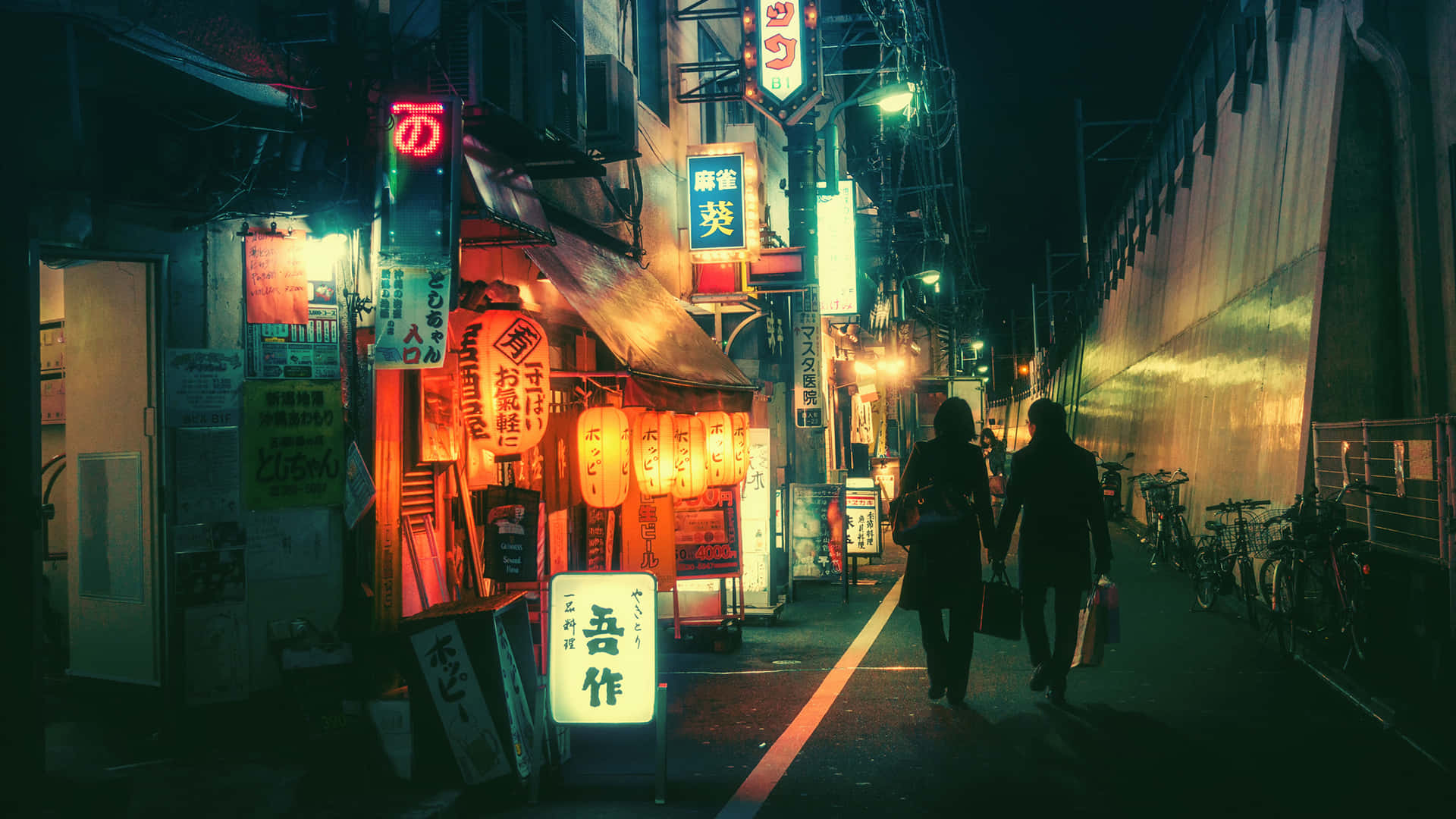 A Street With A Lot Of Neon Signs Background