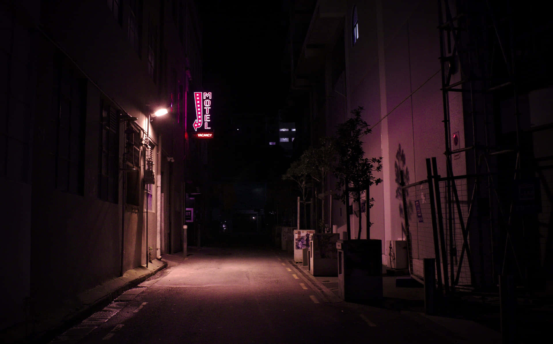 A Street With A Sign Background