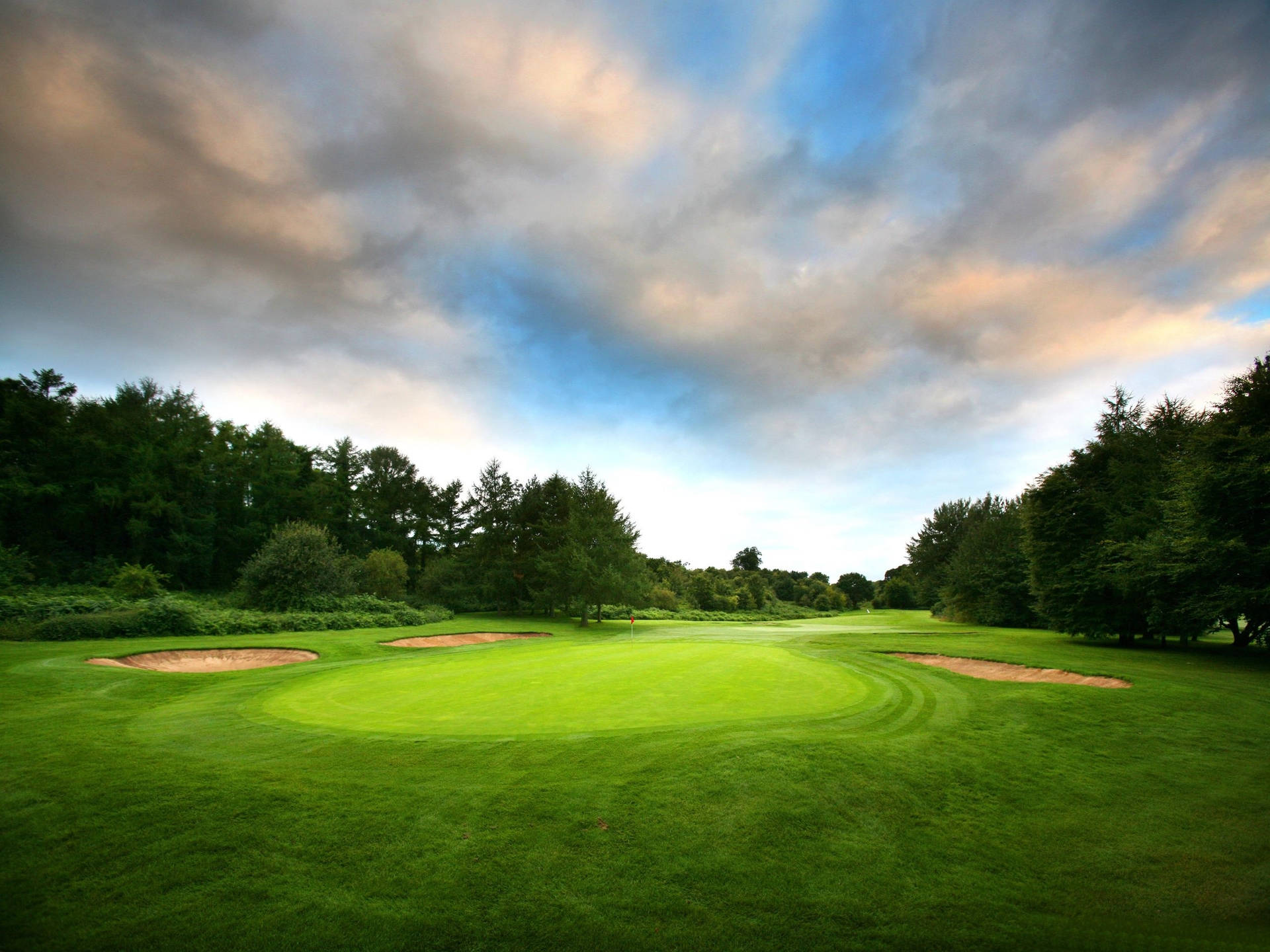 A Striking Scenic Aerial View Of A Golf Course Background