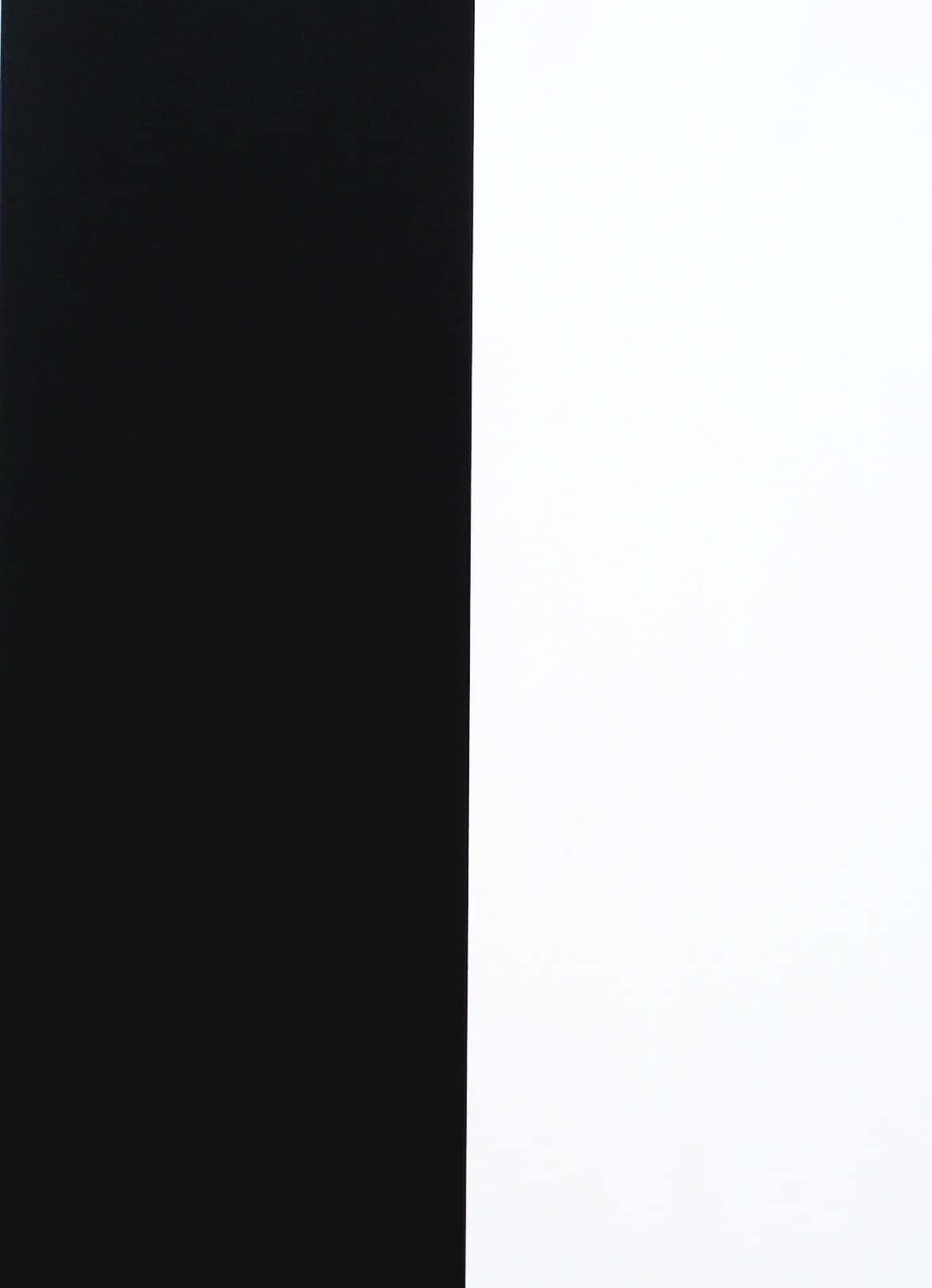 A Striking Split Background With Half Black And Half White Background