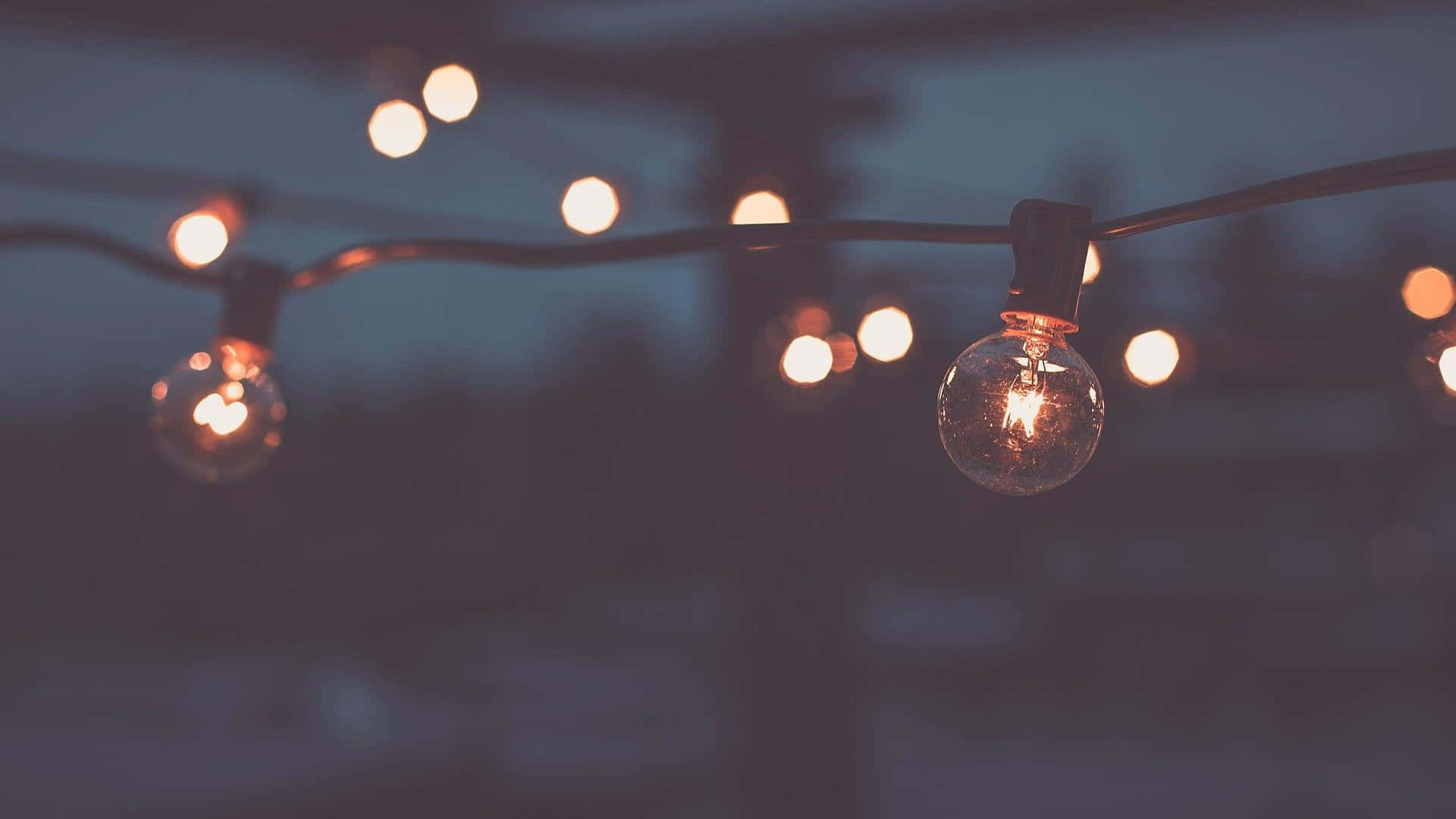 A String Of Lights With Lights On It Background