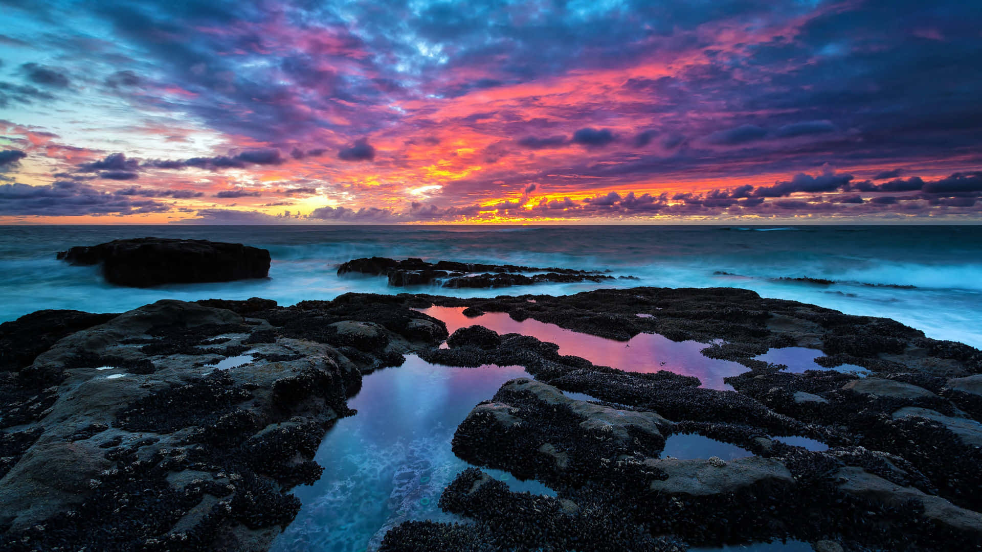 A Stunning Blue And Purple Sunset Marks The End Of A Perfect Day Background