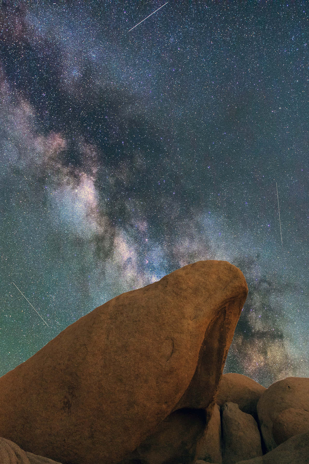 A Stunning Display Of Cosmic Impact: Meteor Shower In The Night Sky Background