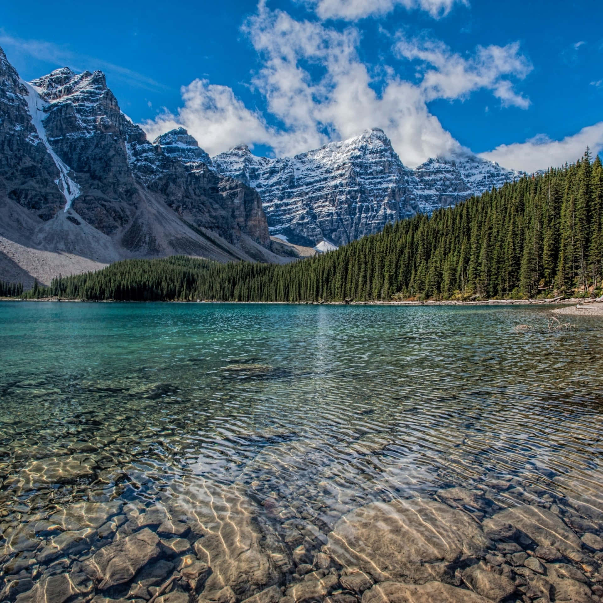 A Stunning Natural Landscape Illuminated By The Sun's Rays Background